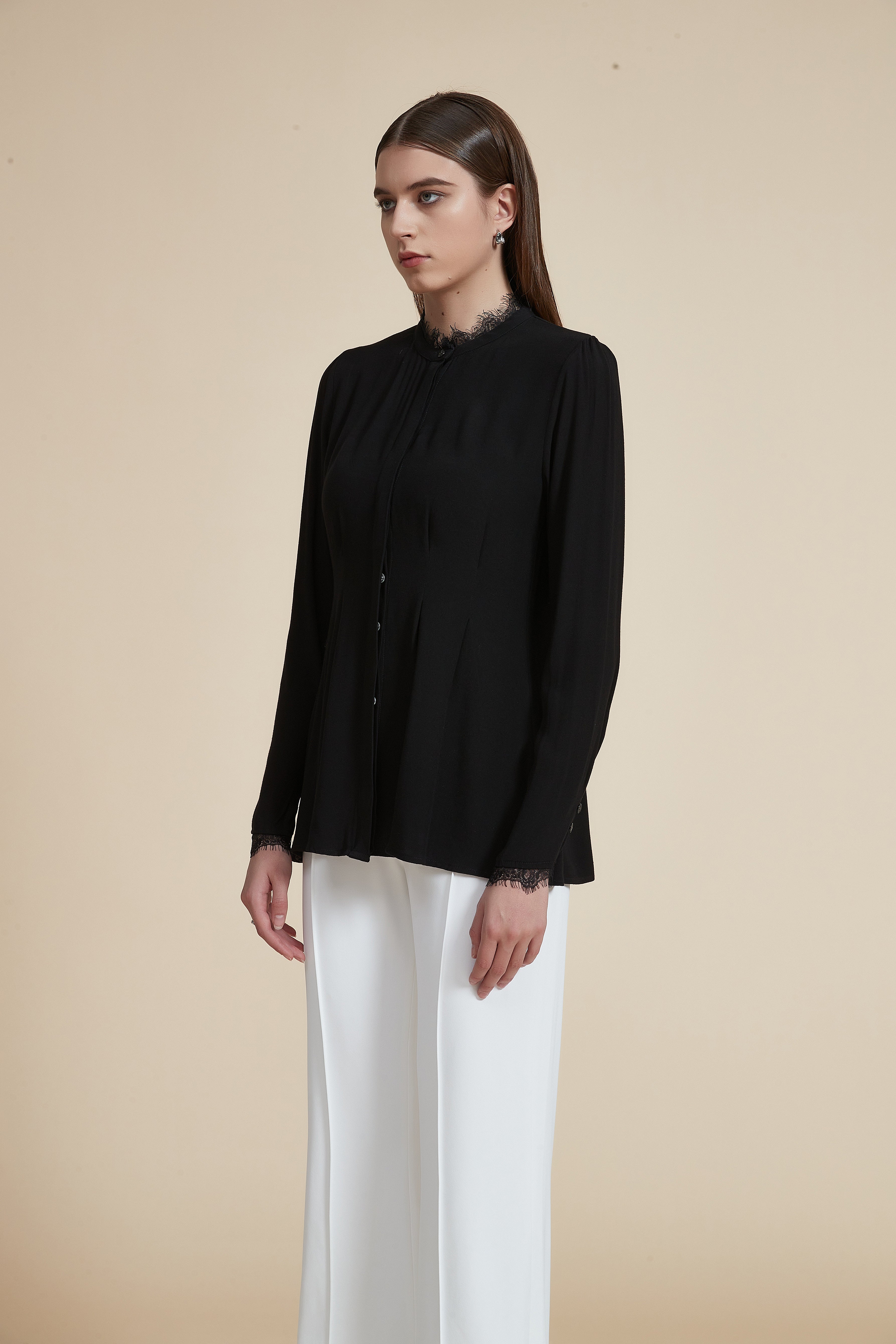 Solid Long Sleeve Ruffled Hip-Length Blouse