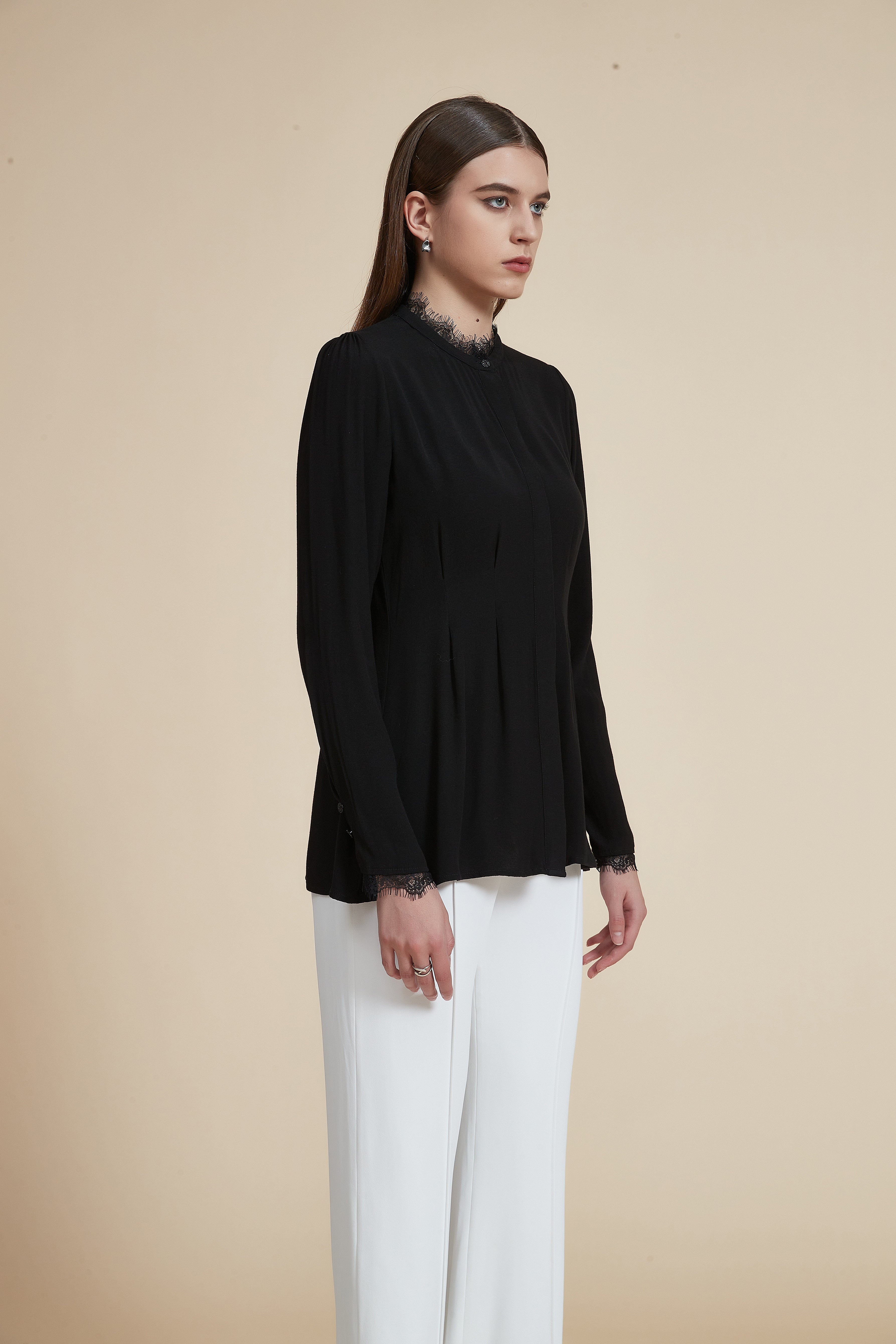 Solid Long Sleeve Ruffled Hip-Length Blouse