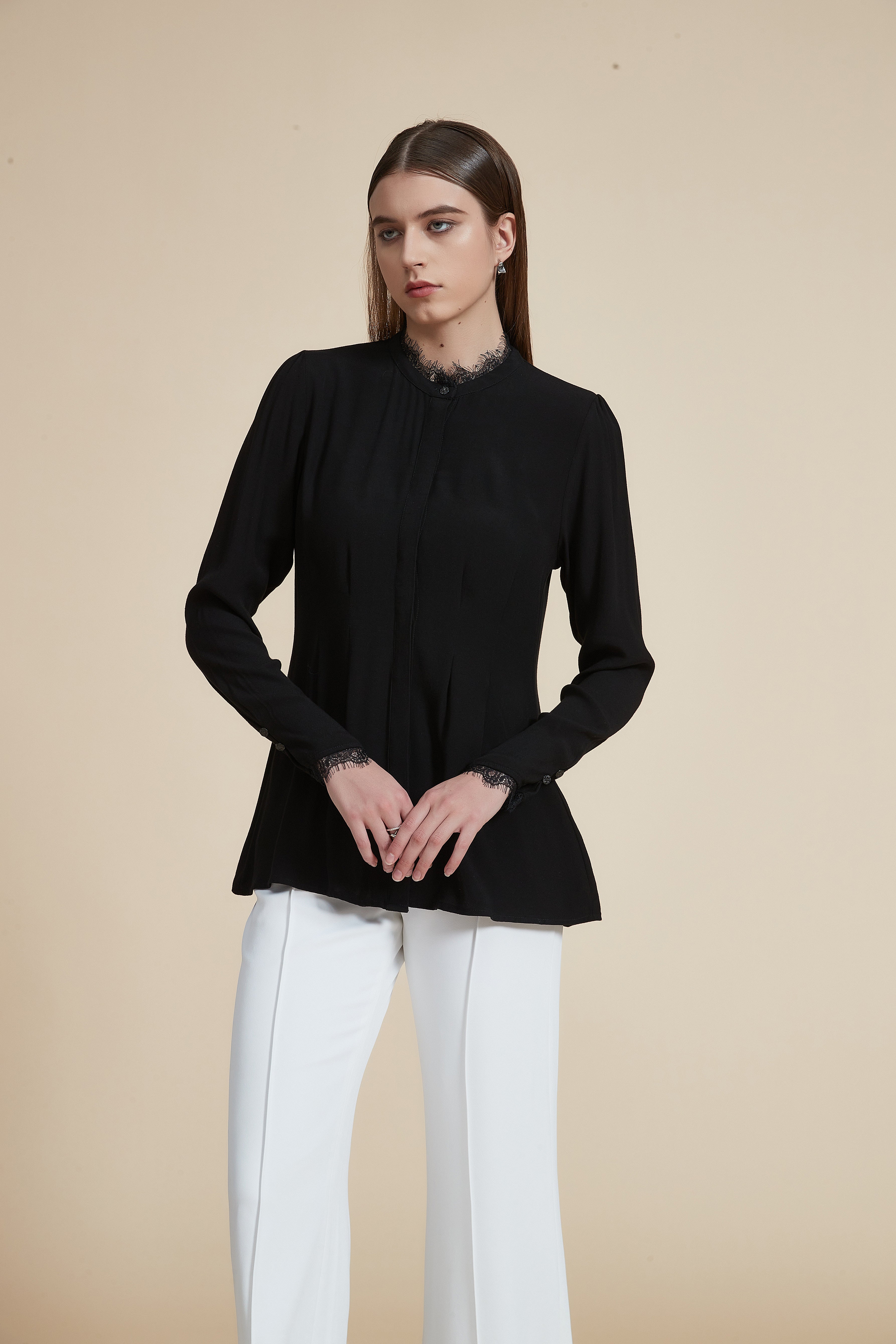 Solid Long Sleeve Ruffled Hip-Length Blouse