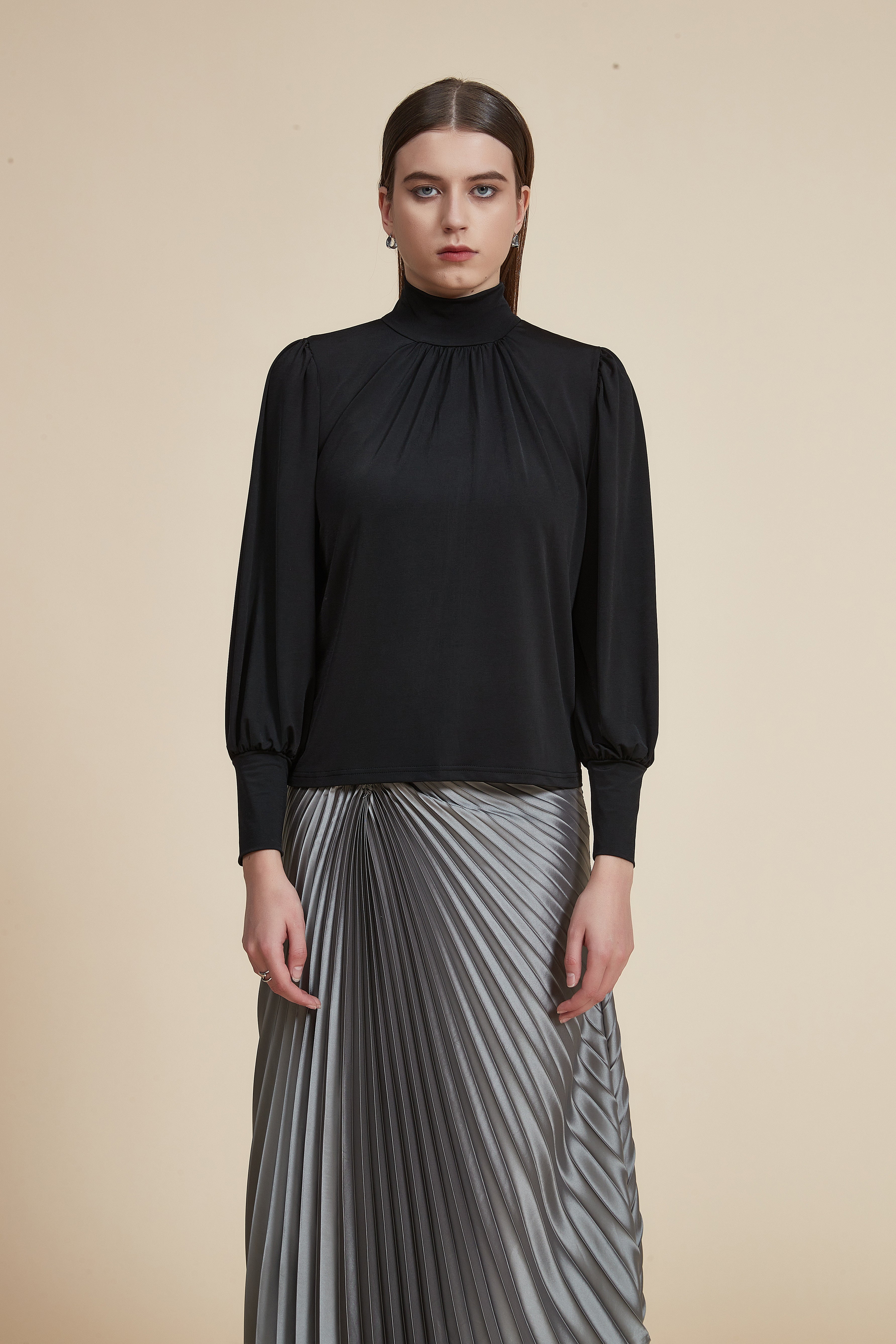 Long sleeve blouse with high neck and ruffle on the chest