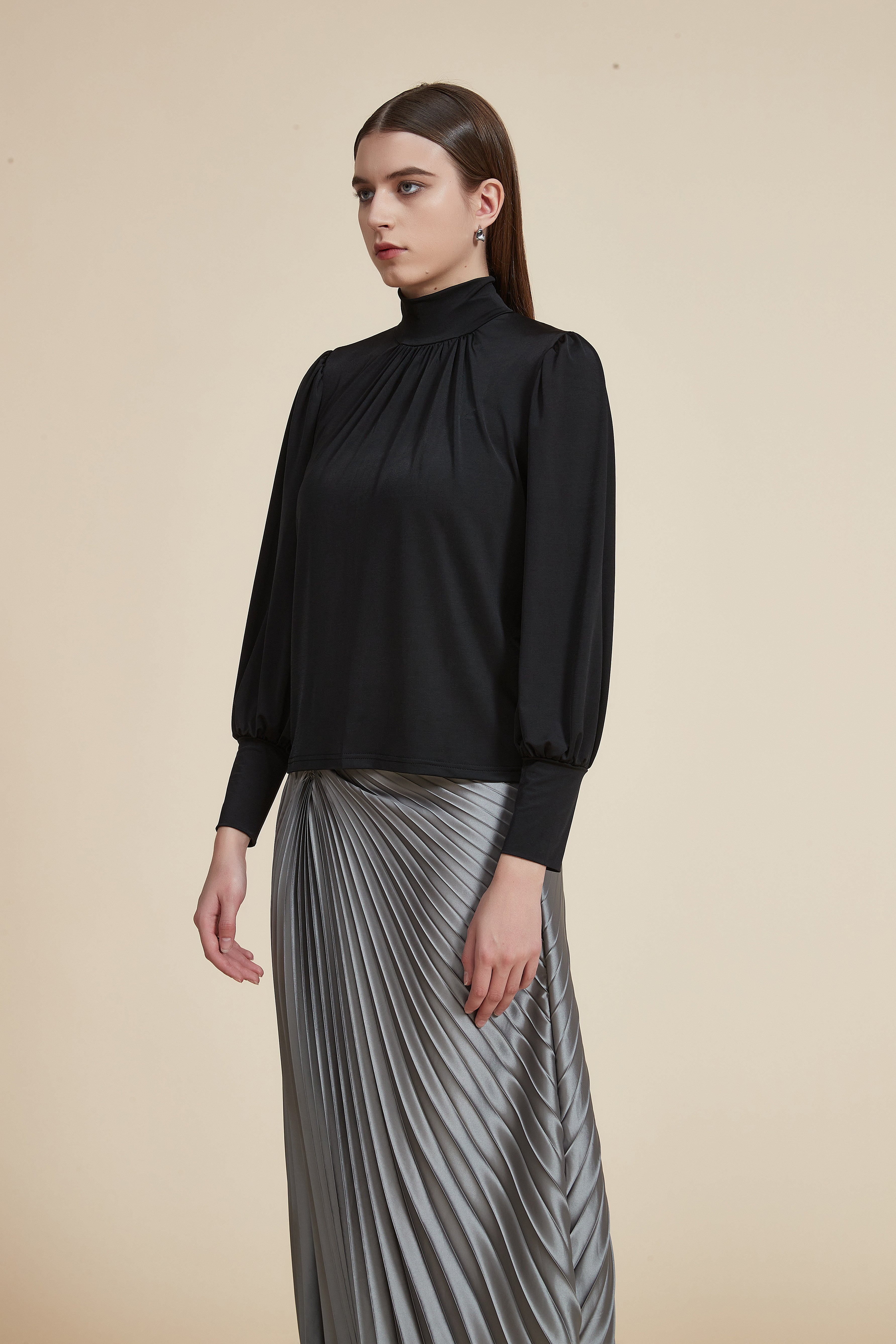 Long sleeve blouse with high neck and ruffle on the chest