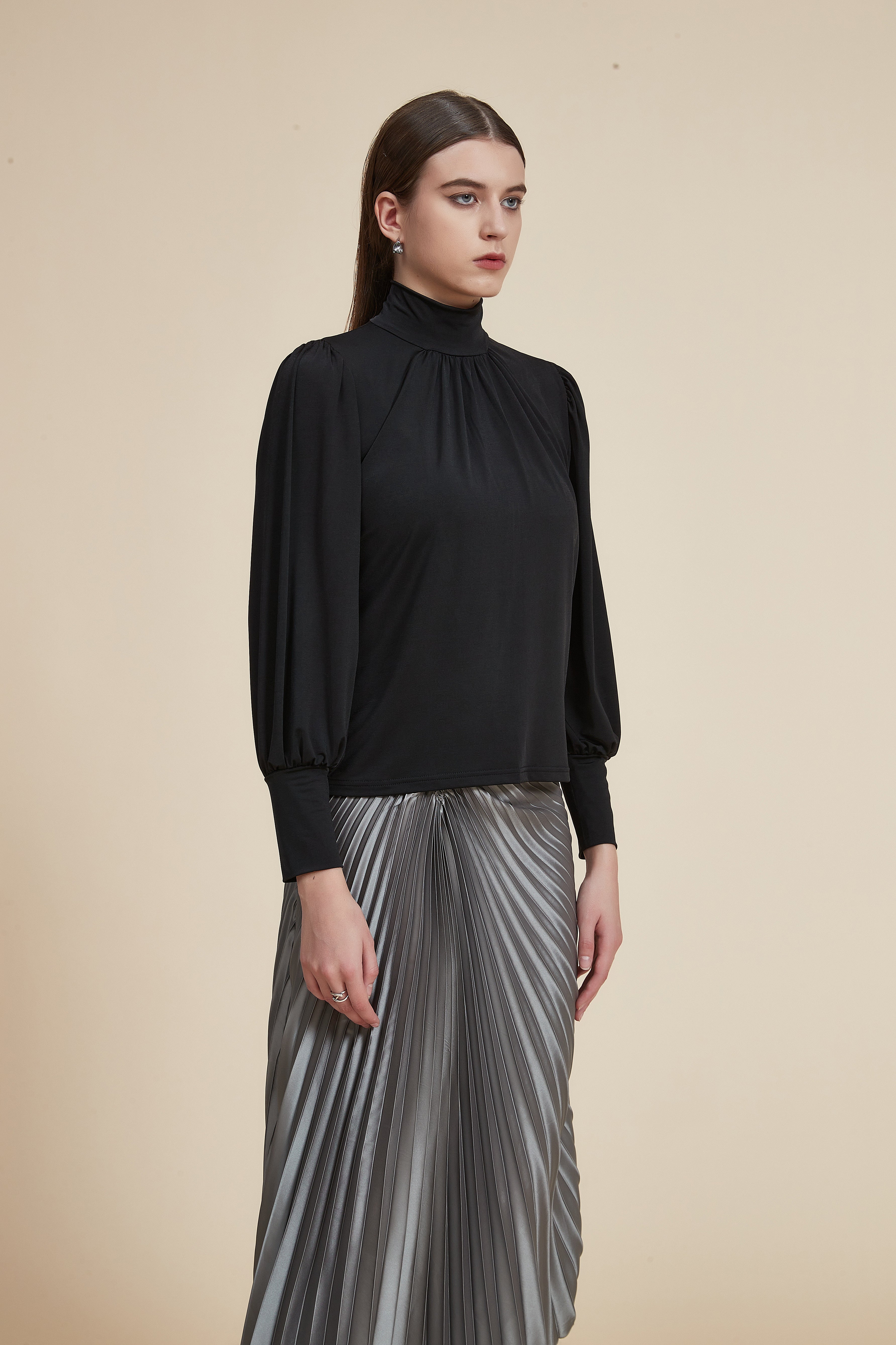 Long sleeve blouse with high neck and ruffle on the chest