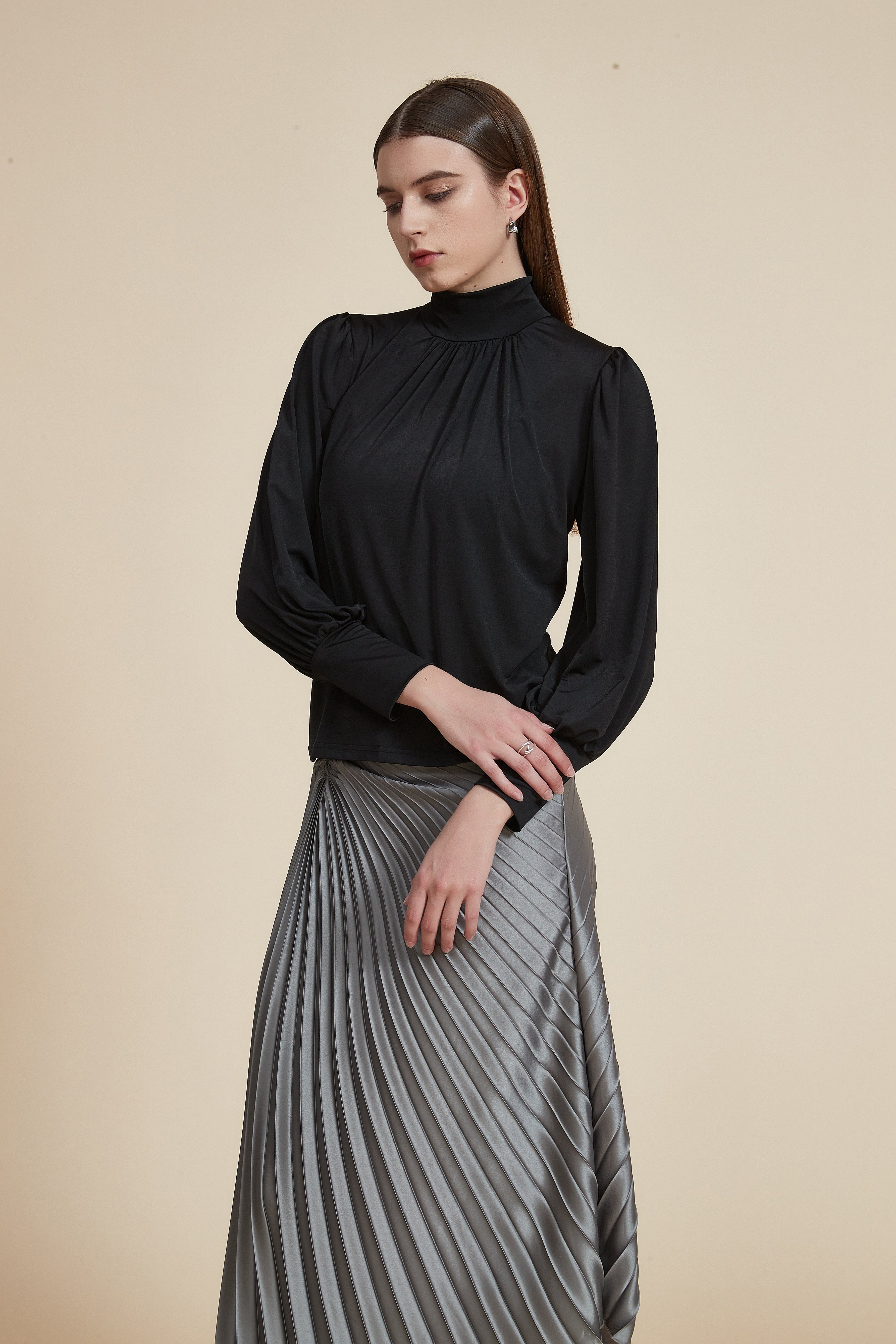 Long sleeve blouse with high neck and ruffle on the chest