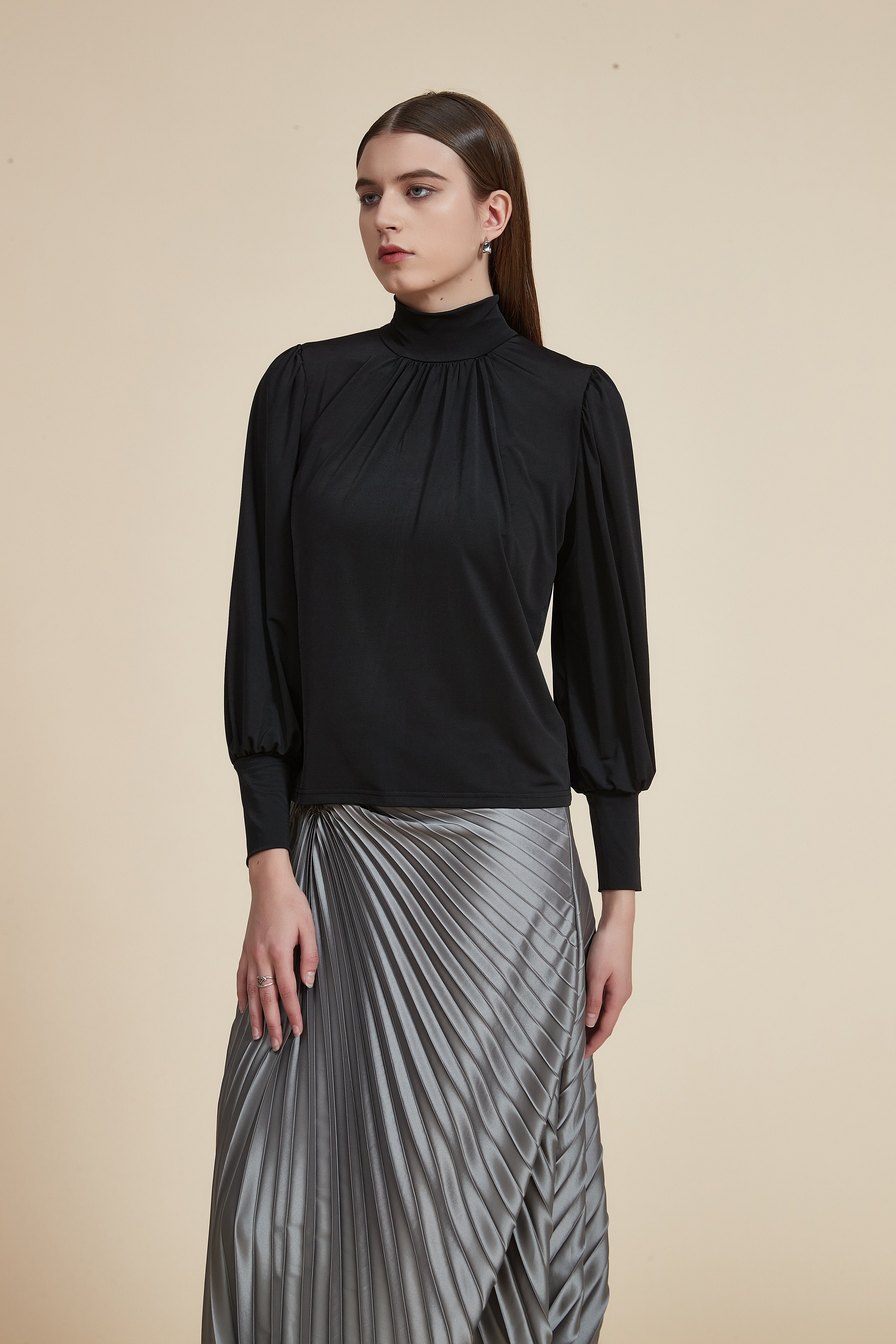 Long sleeve blouse with high neck and ruffle on the chest