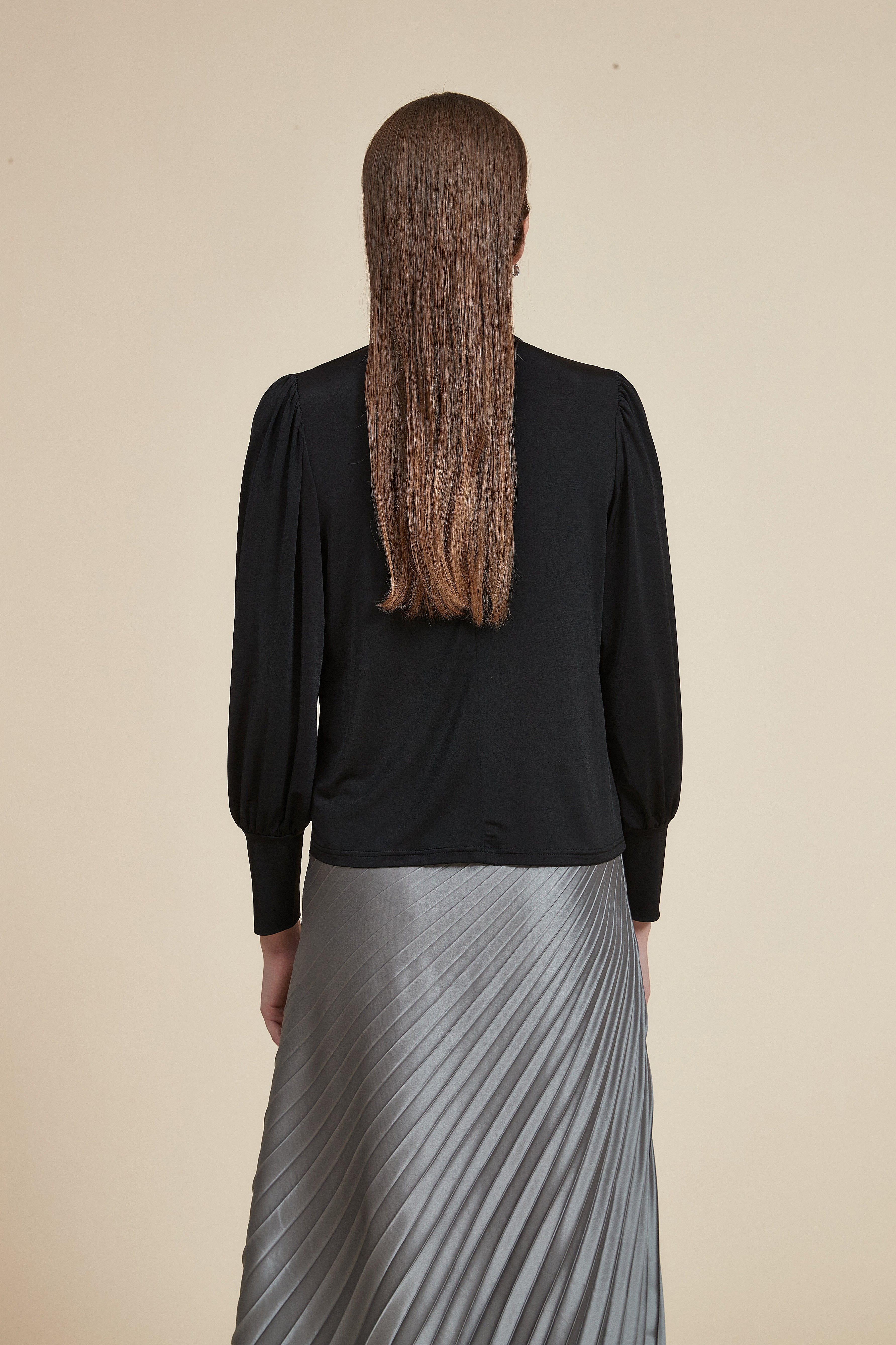 Long sleeve blouse with high neck and ruffle on the chest