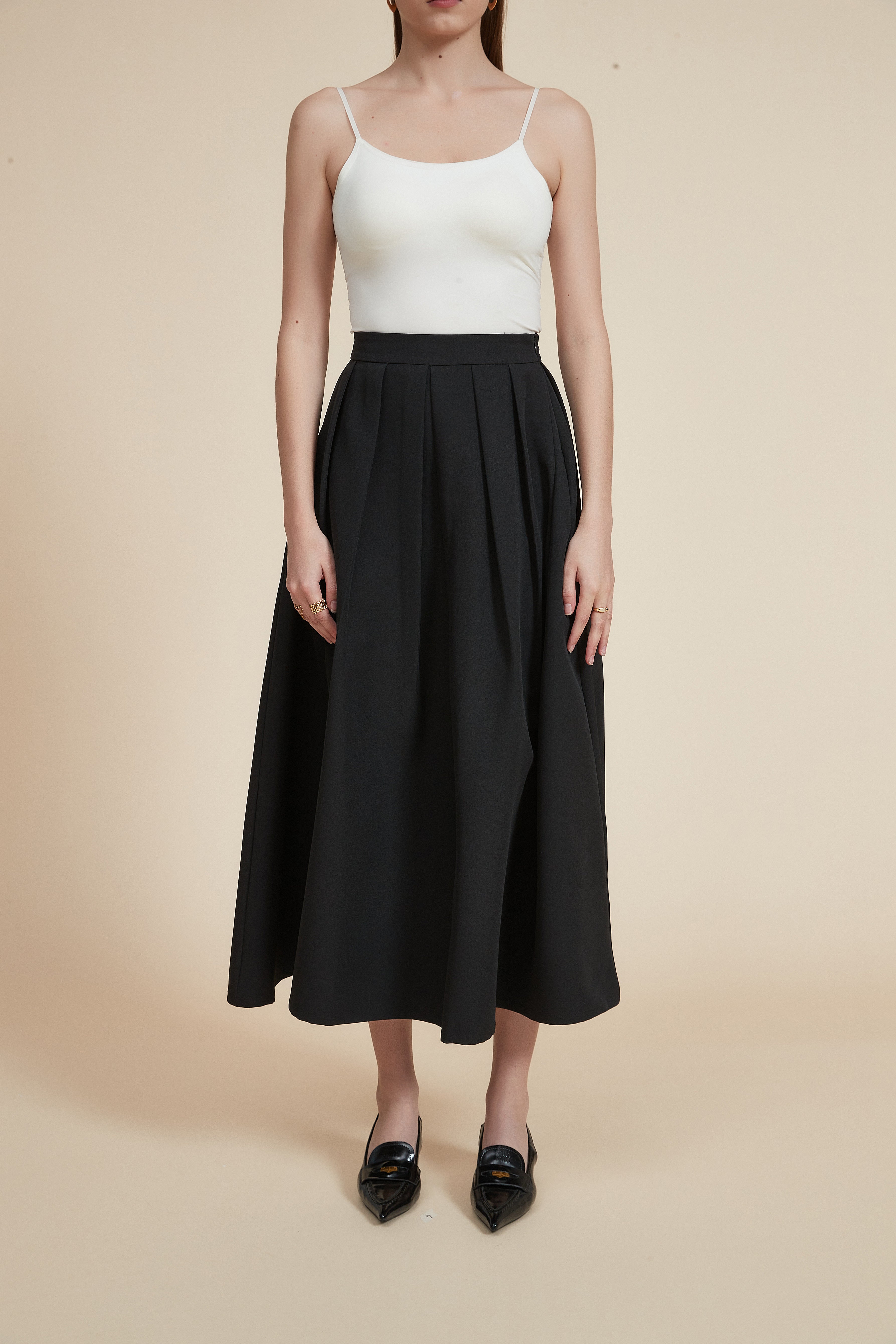 تنورة ميدي مكشكشة سادة