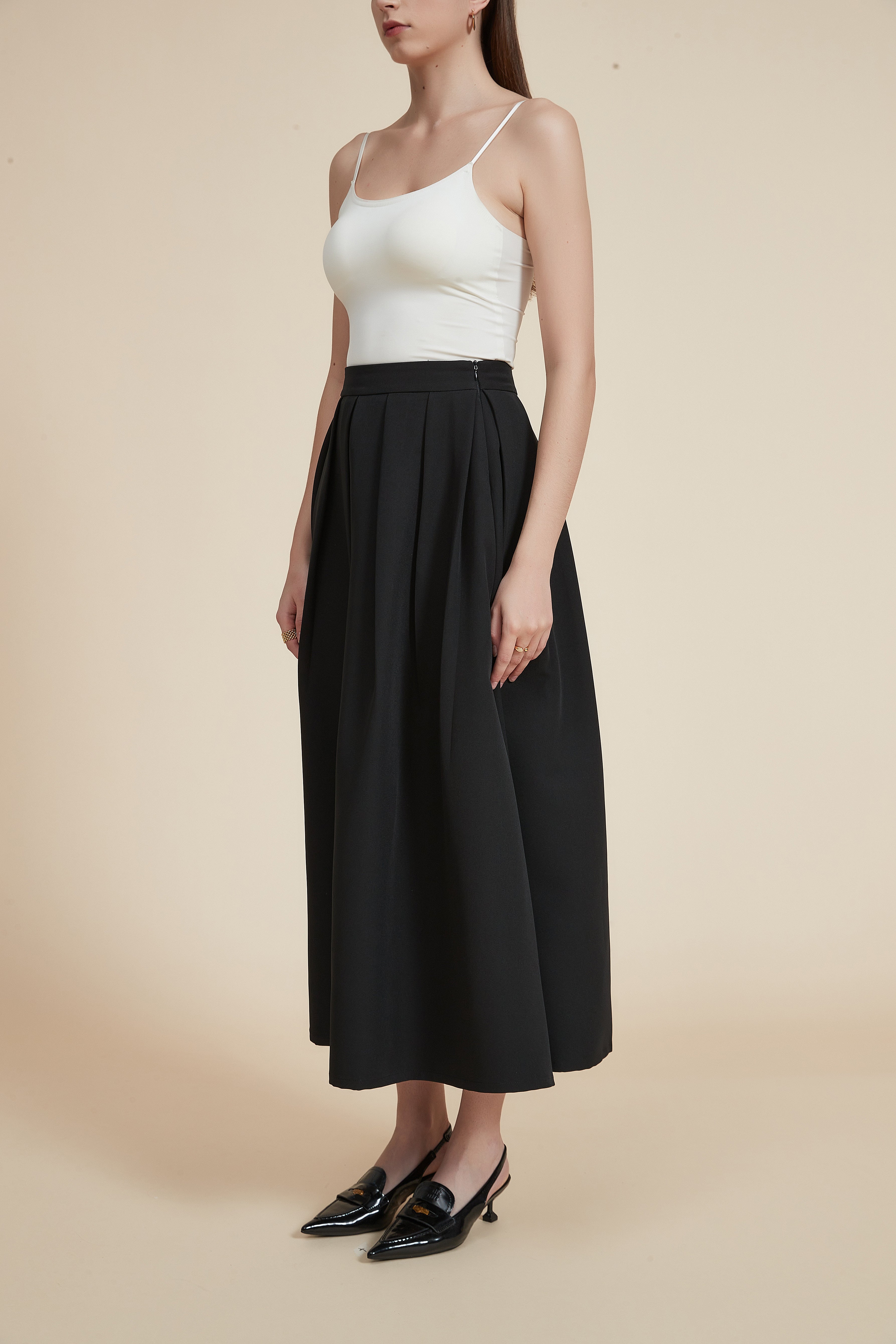 تنورة ميدي مكشكشة سادة