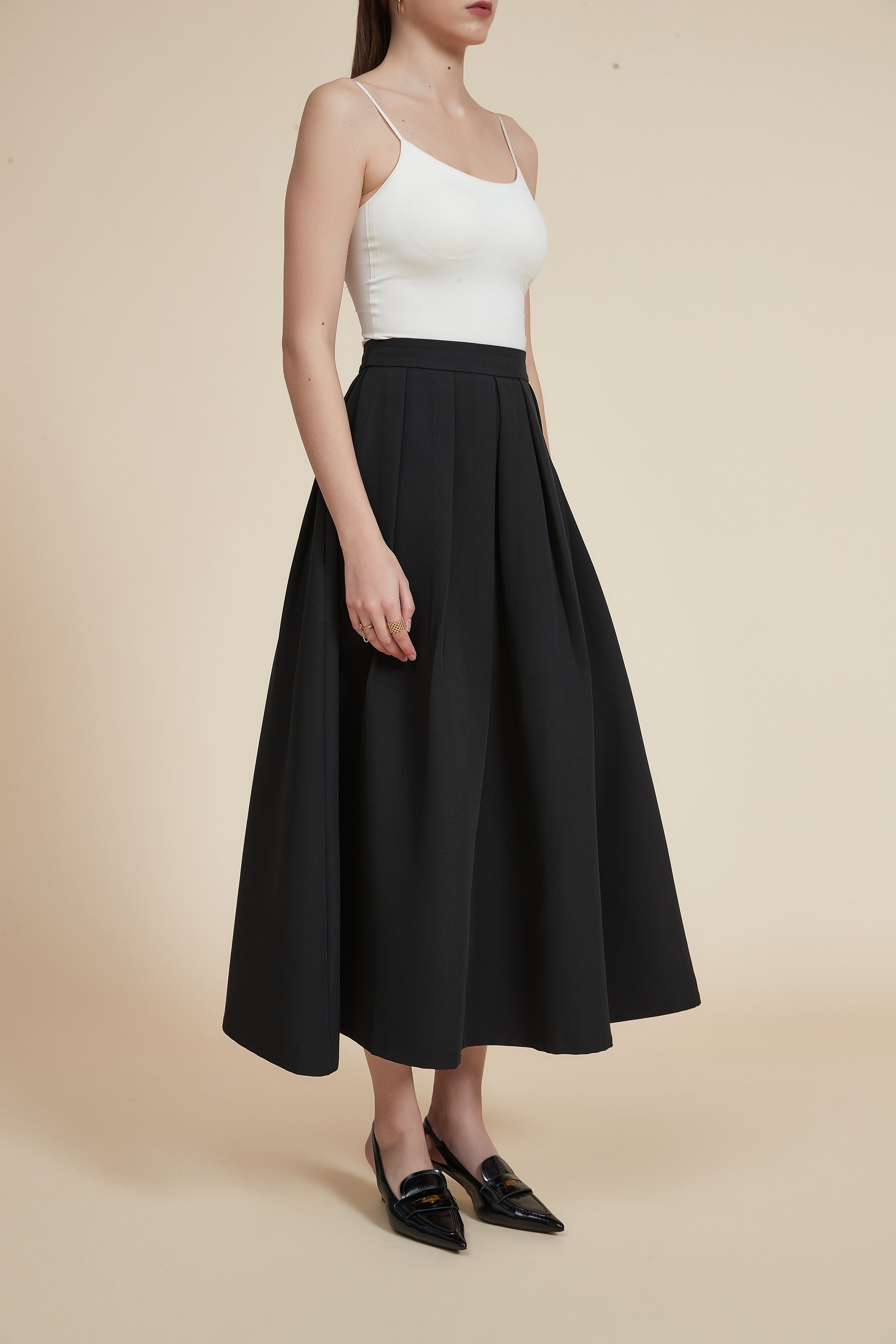 تنورة ميدي مكشكشة سادة