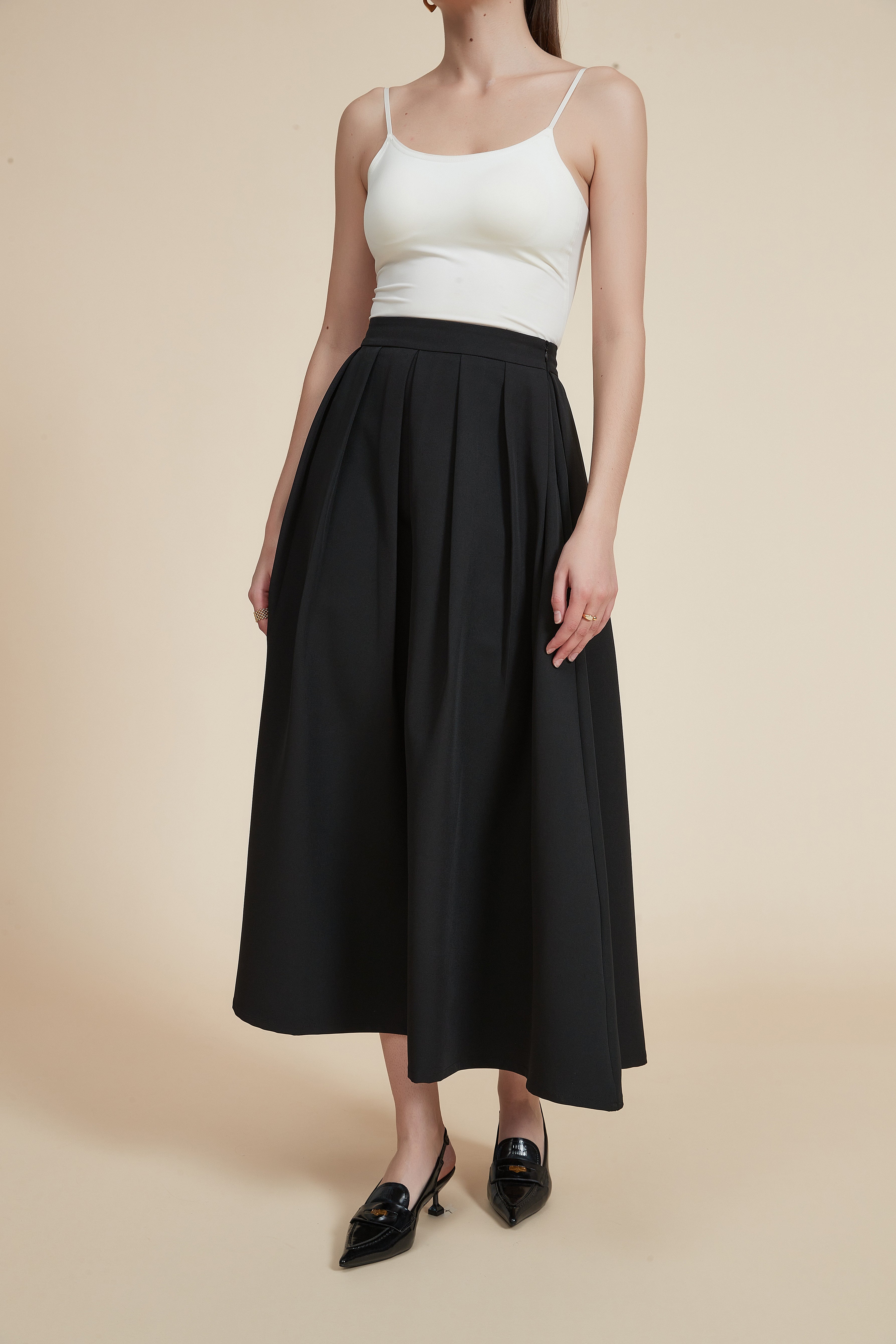 تنورة ميدي مكشكشة سادة