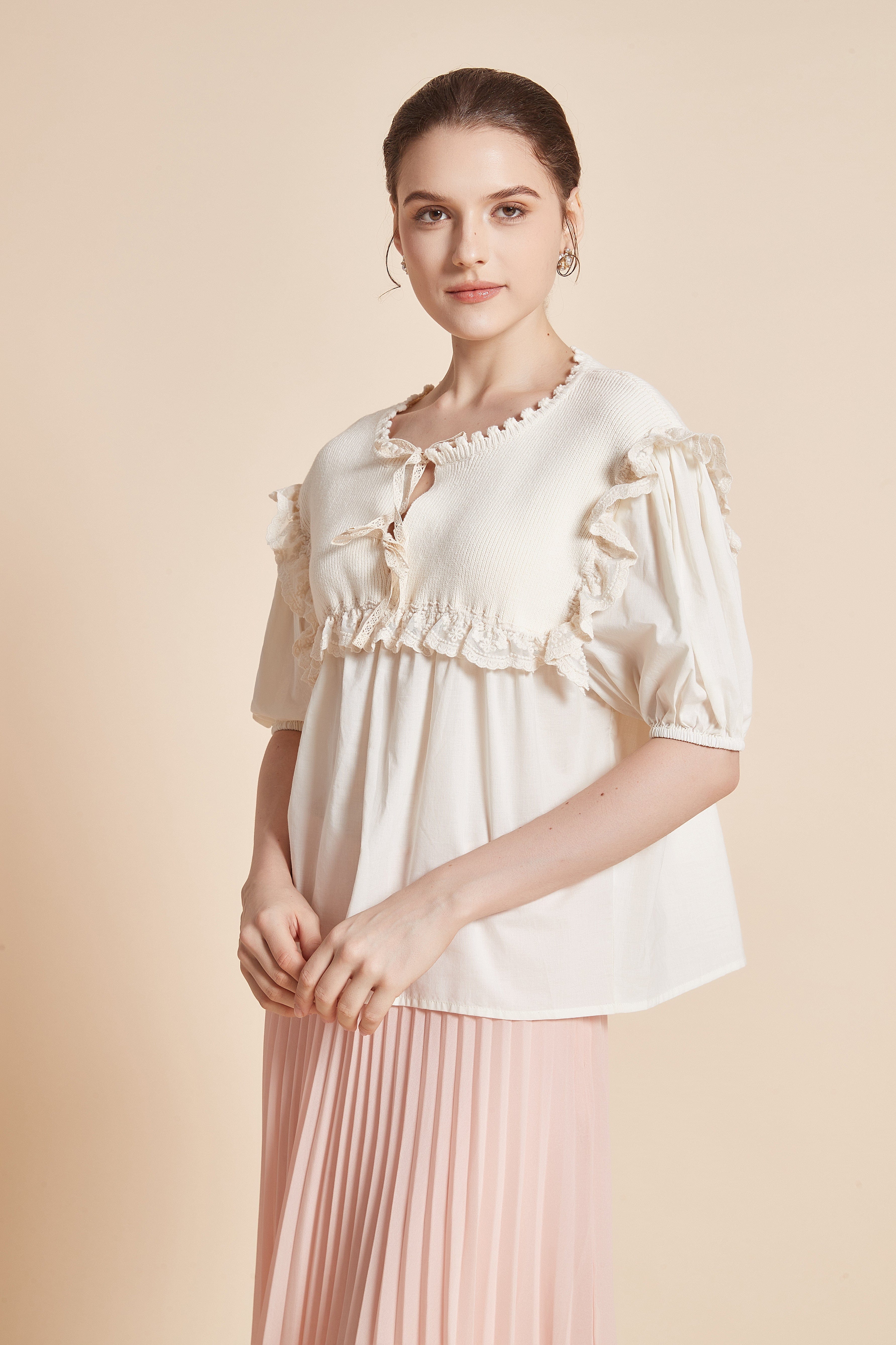 Half-Sleeve Blouse With Round Neck And Ruffles On Shoulders And Chest