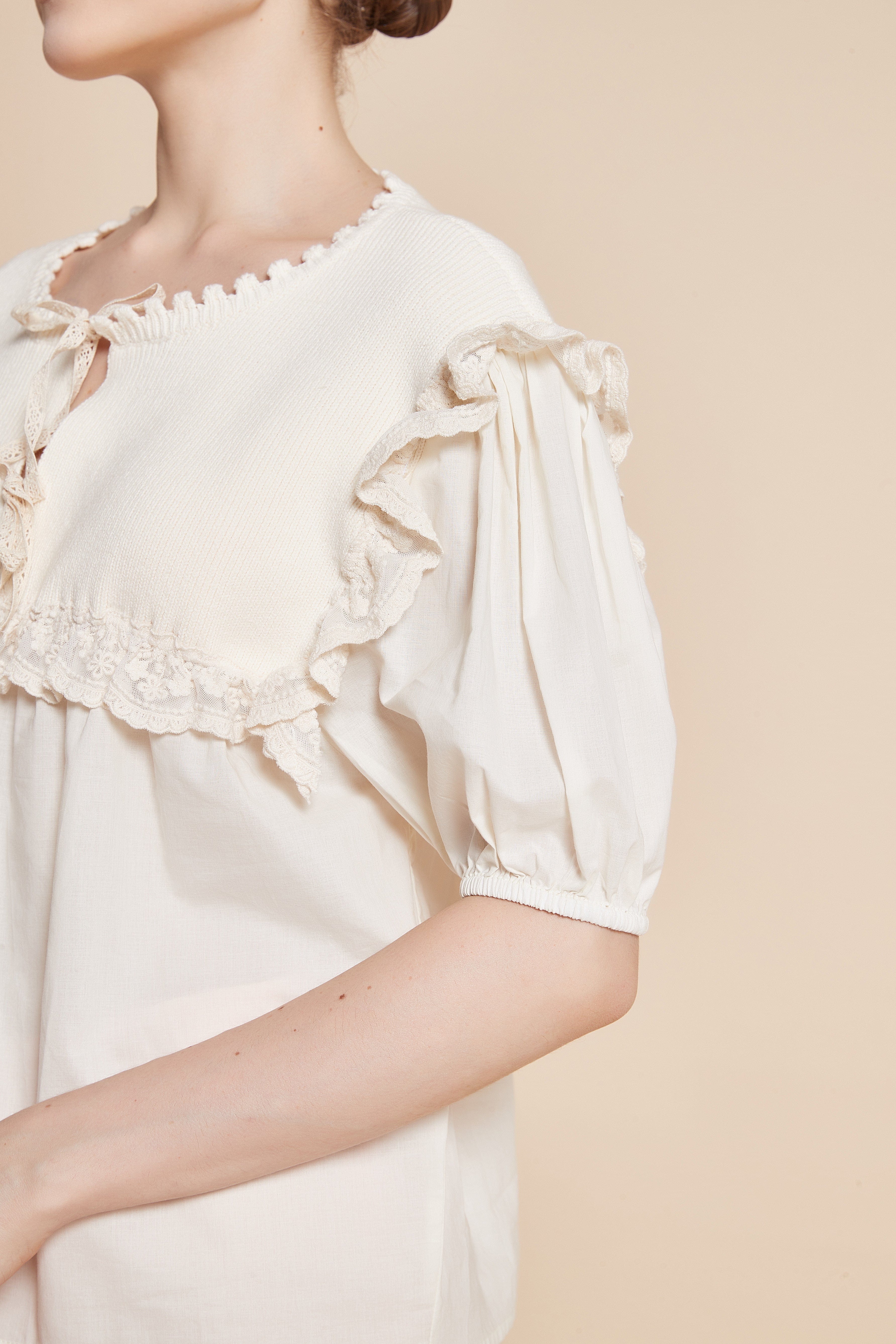 Half-Sleeve Blouse With Round Neck And Ruffles On Shoulders And Chest