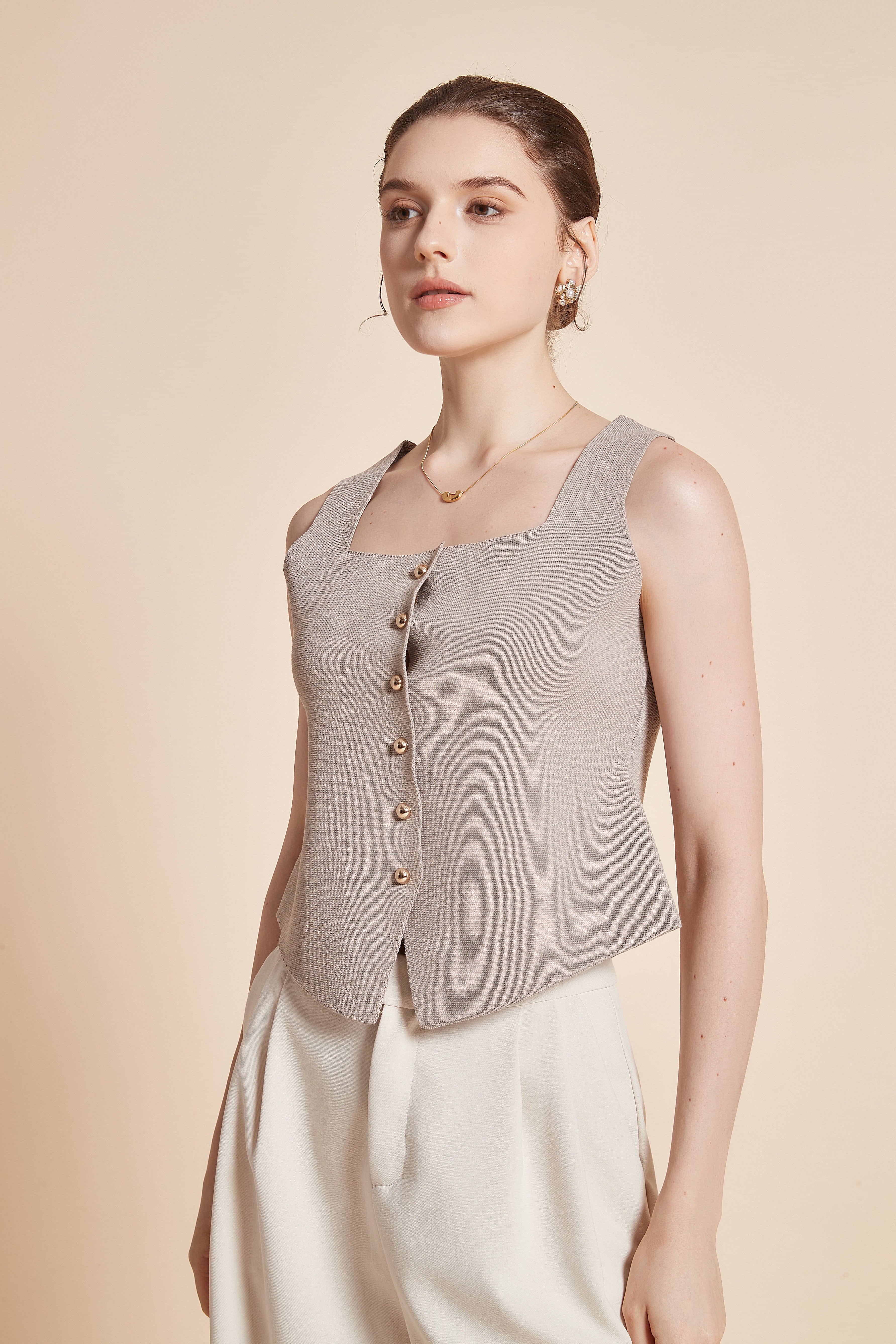 Plain Sleeveless Blouse With Front Buttons