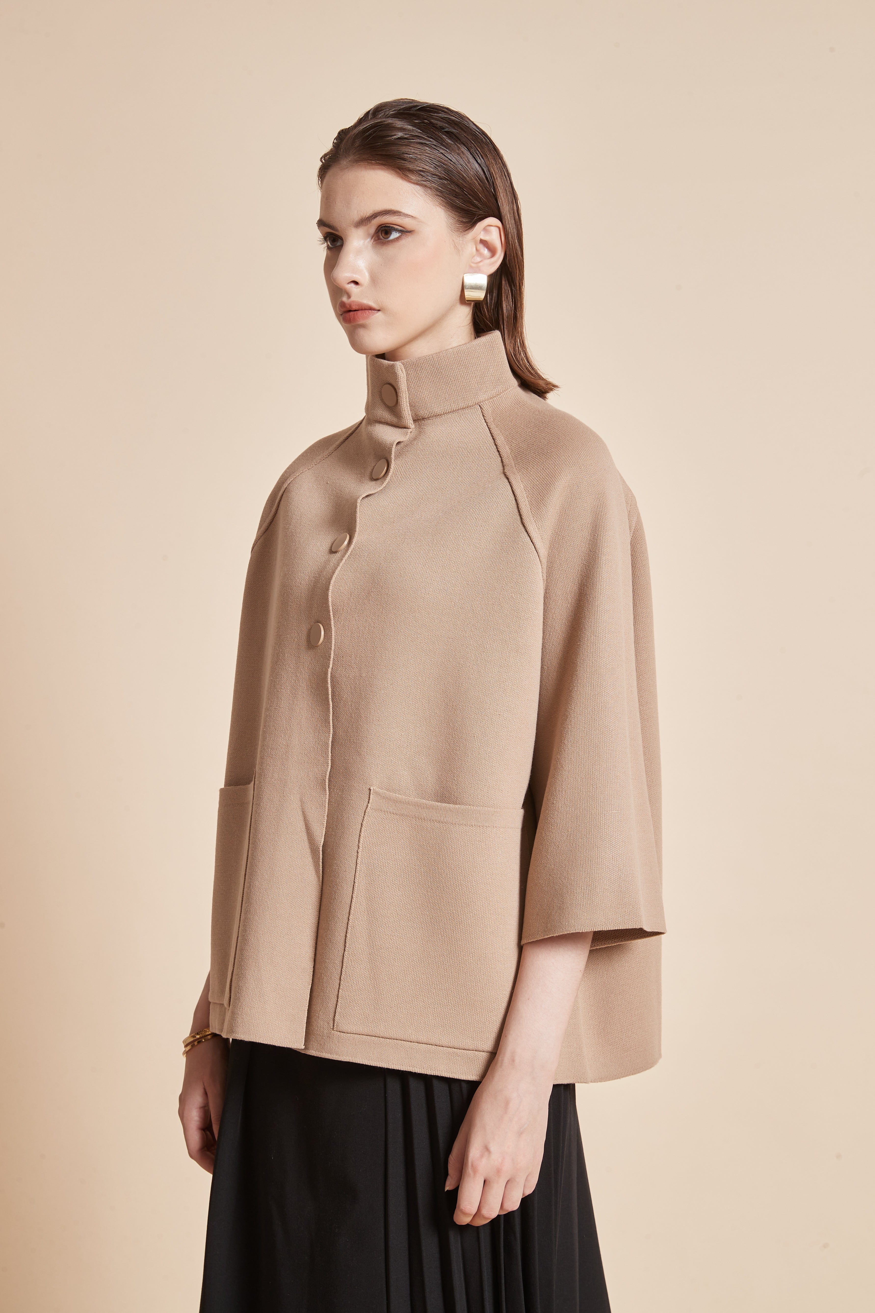High-Neck Jacket With 3/4 Sleeves And Front Buttons With Pockets