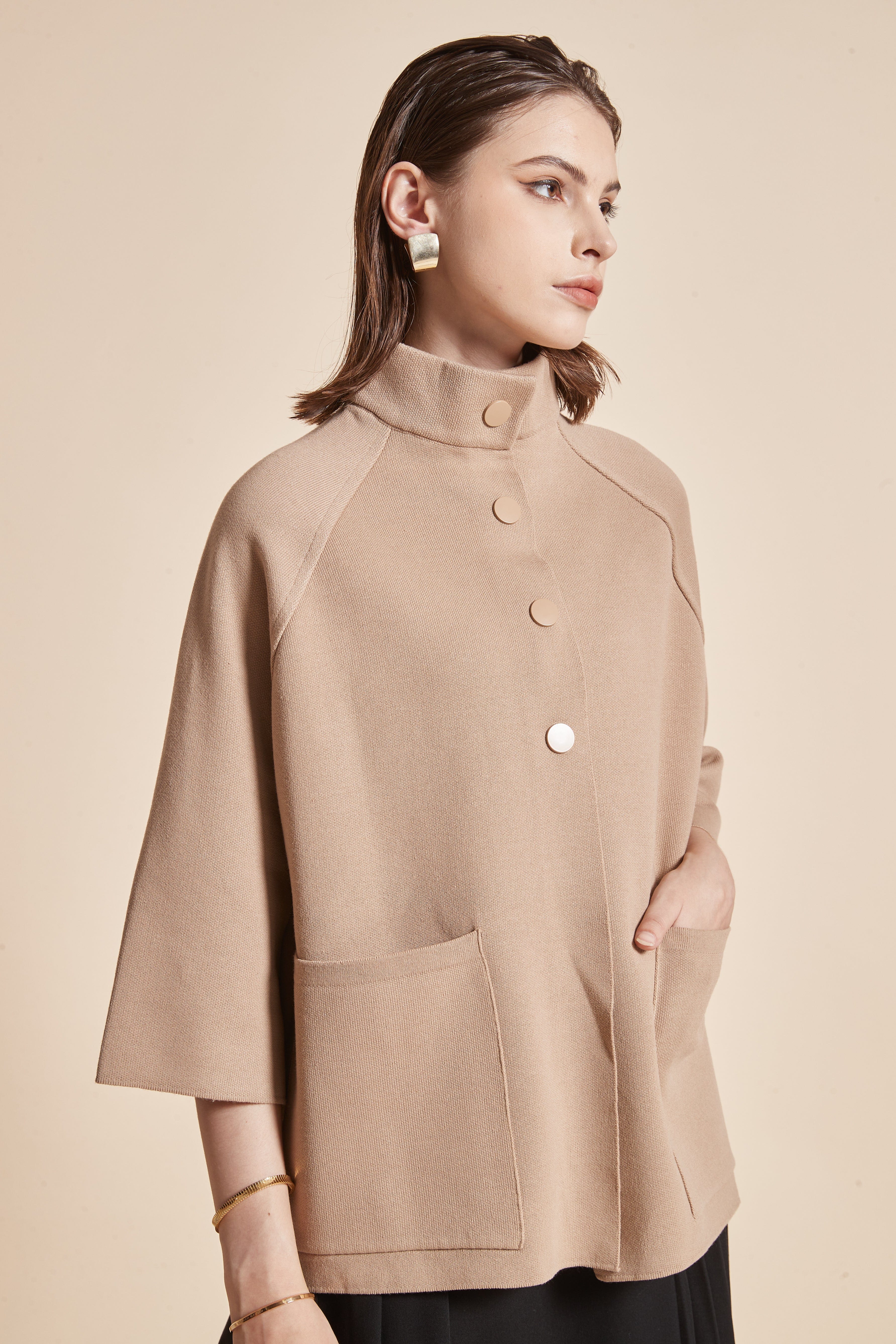High-Neck Jacket With 3/4 Sleeves And Front Buttons With Pockets