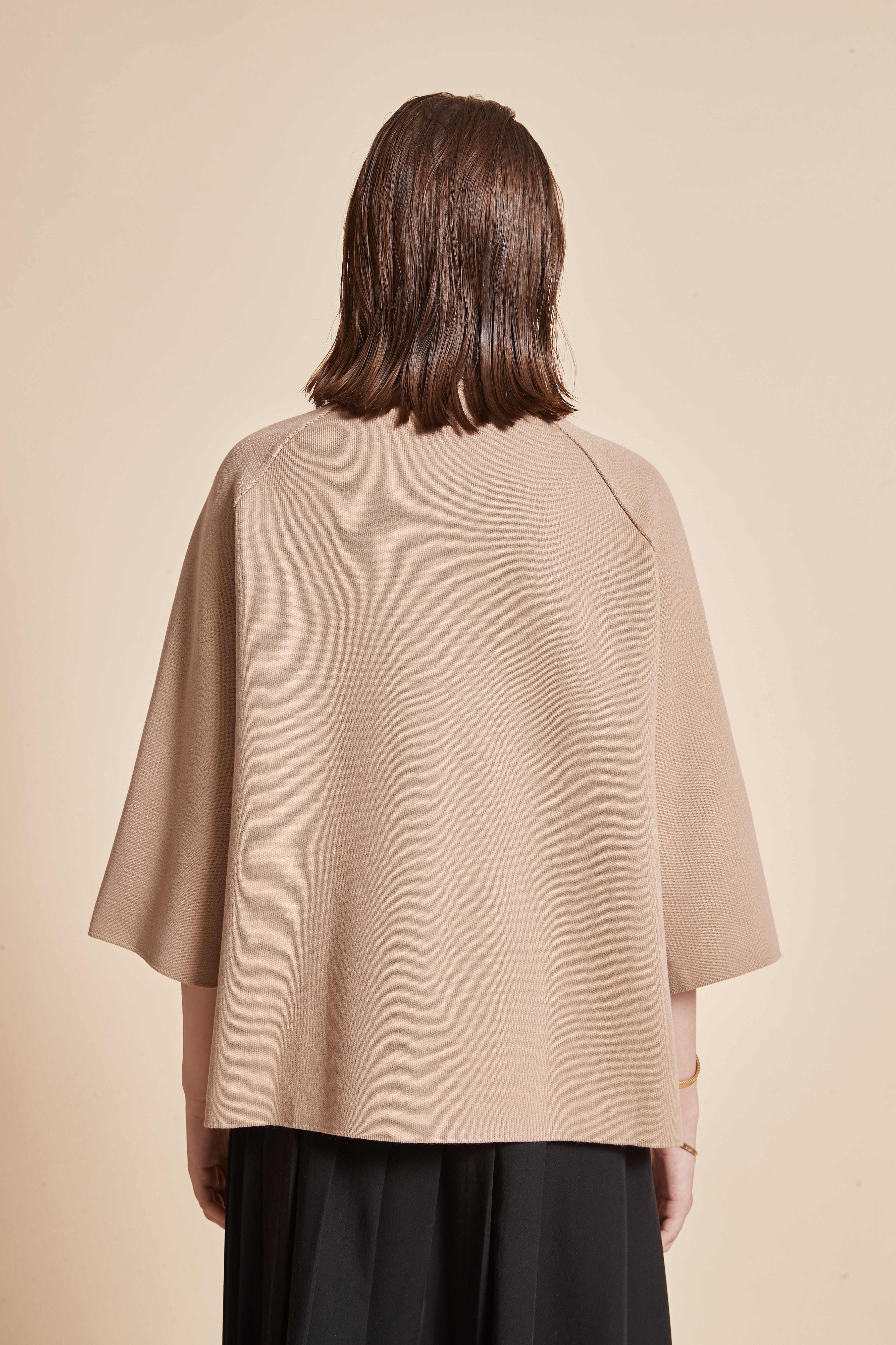 High-Neck Jacket With 3/4 Sleeves And Front Buttons With Pockets