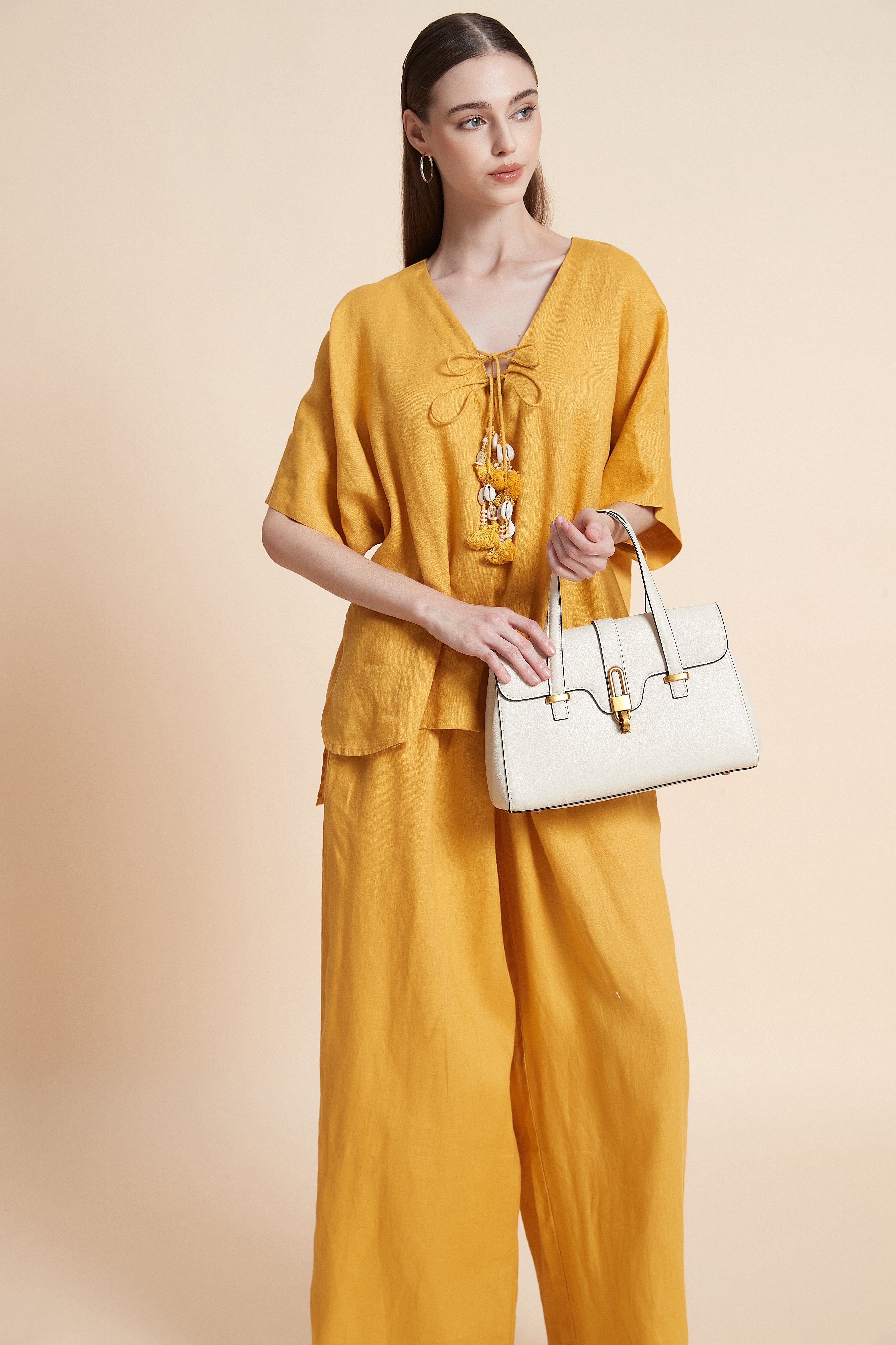 Linen blouse with tassel details