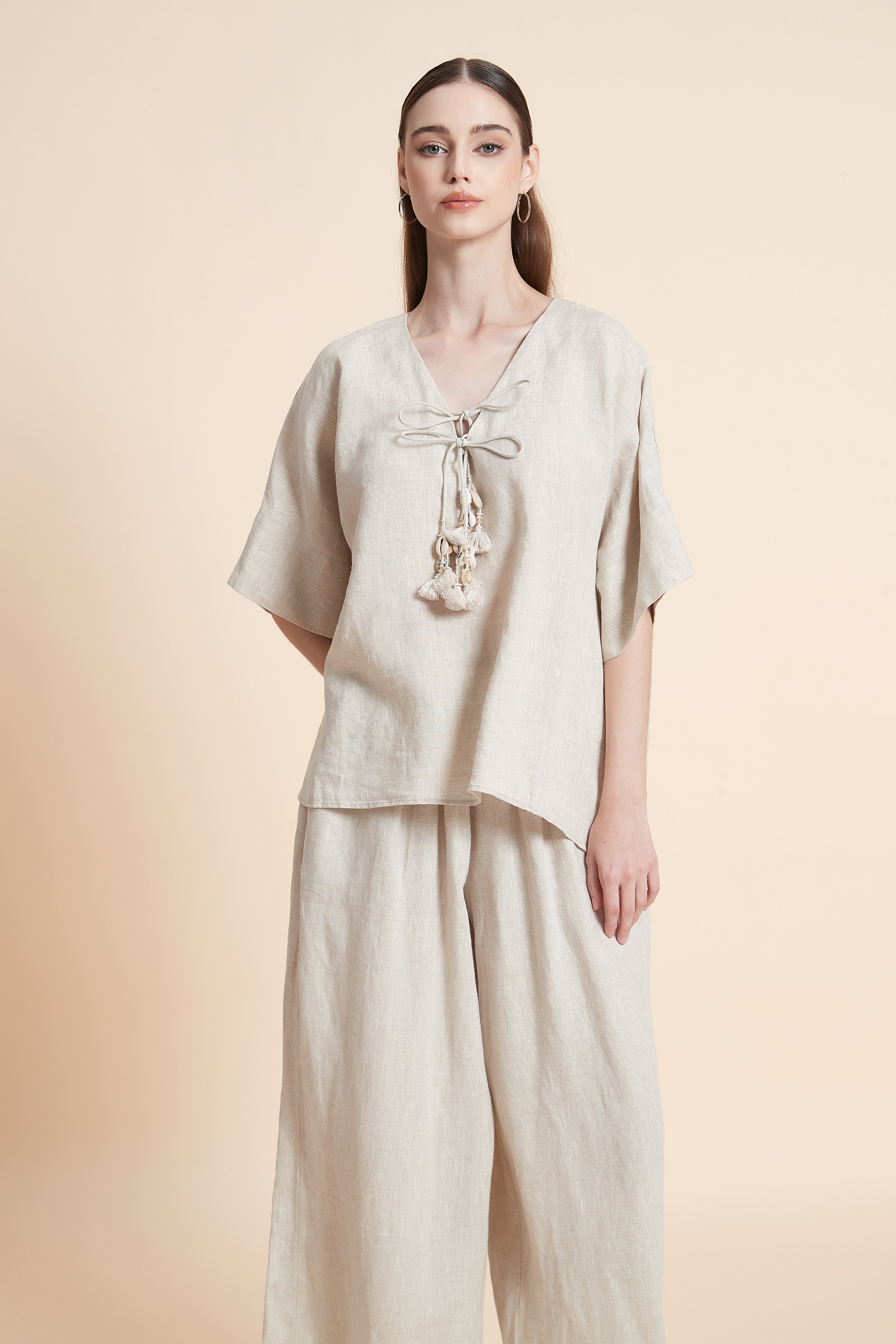 Linen blouse with tassel details