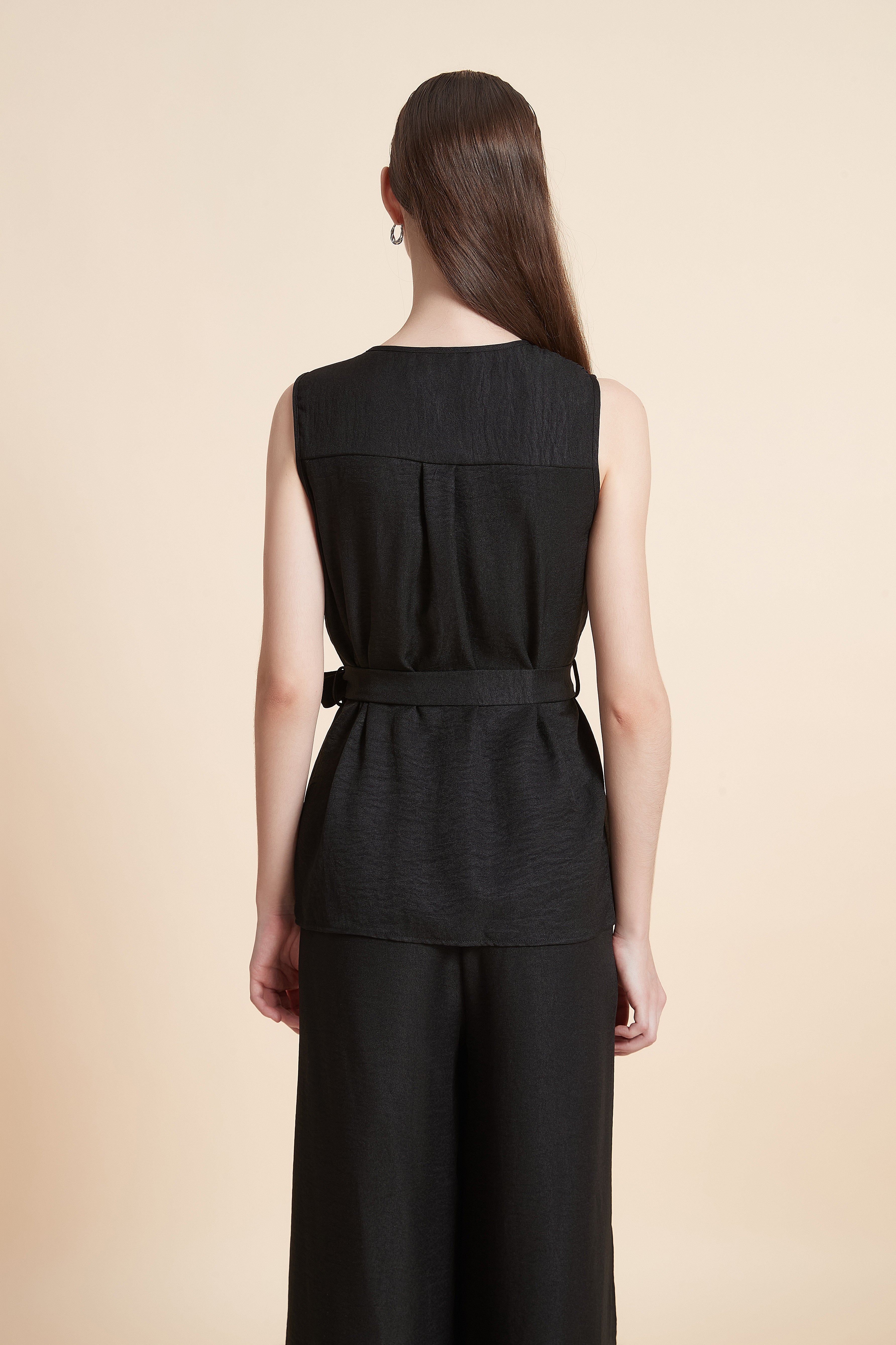 Sleeveless fine-striped top with a belt