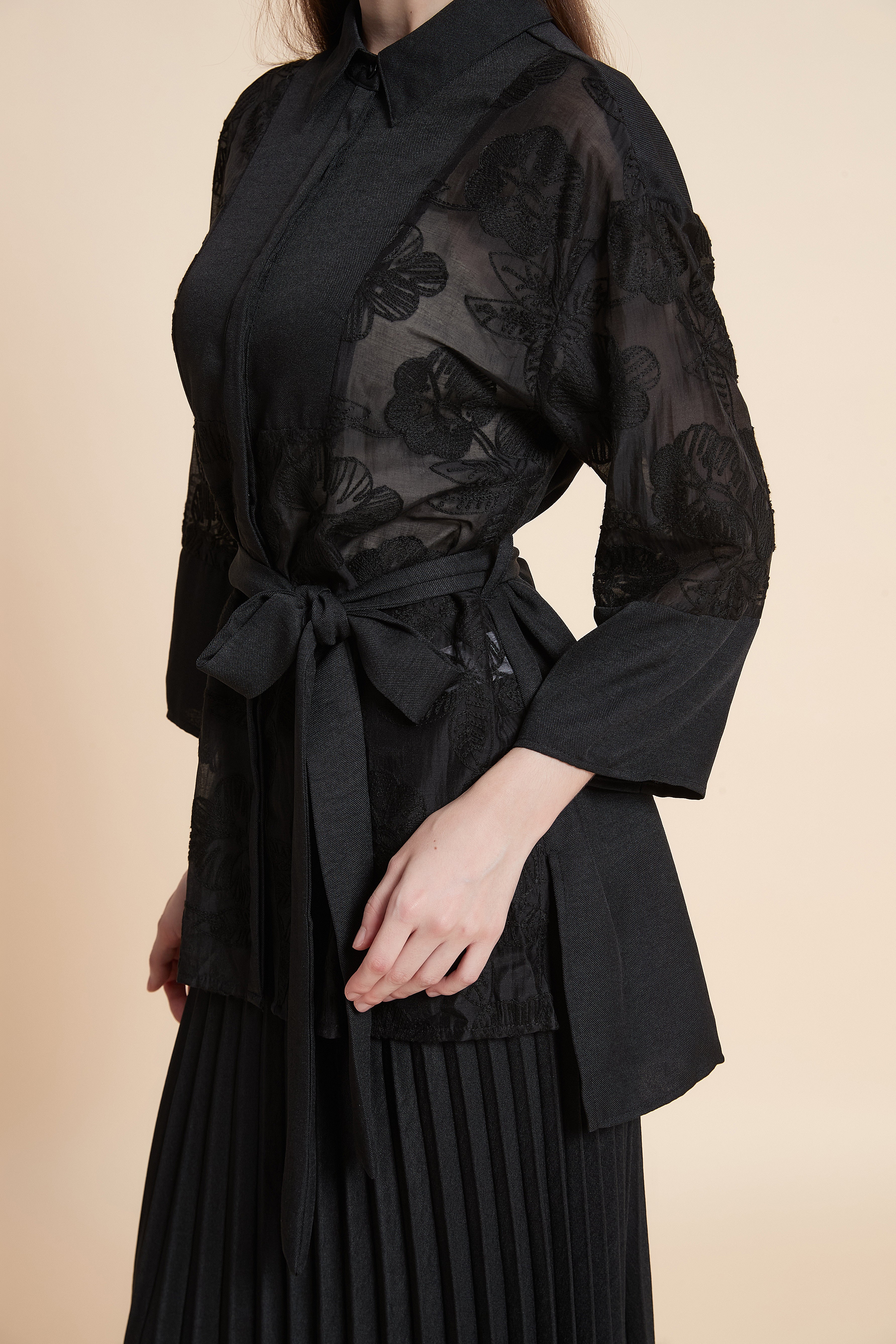 Shirt with a lace belt