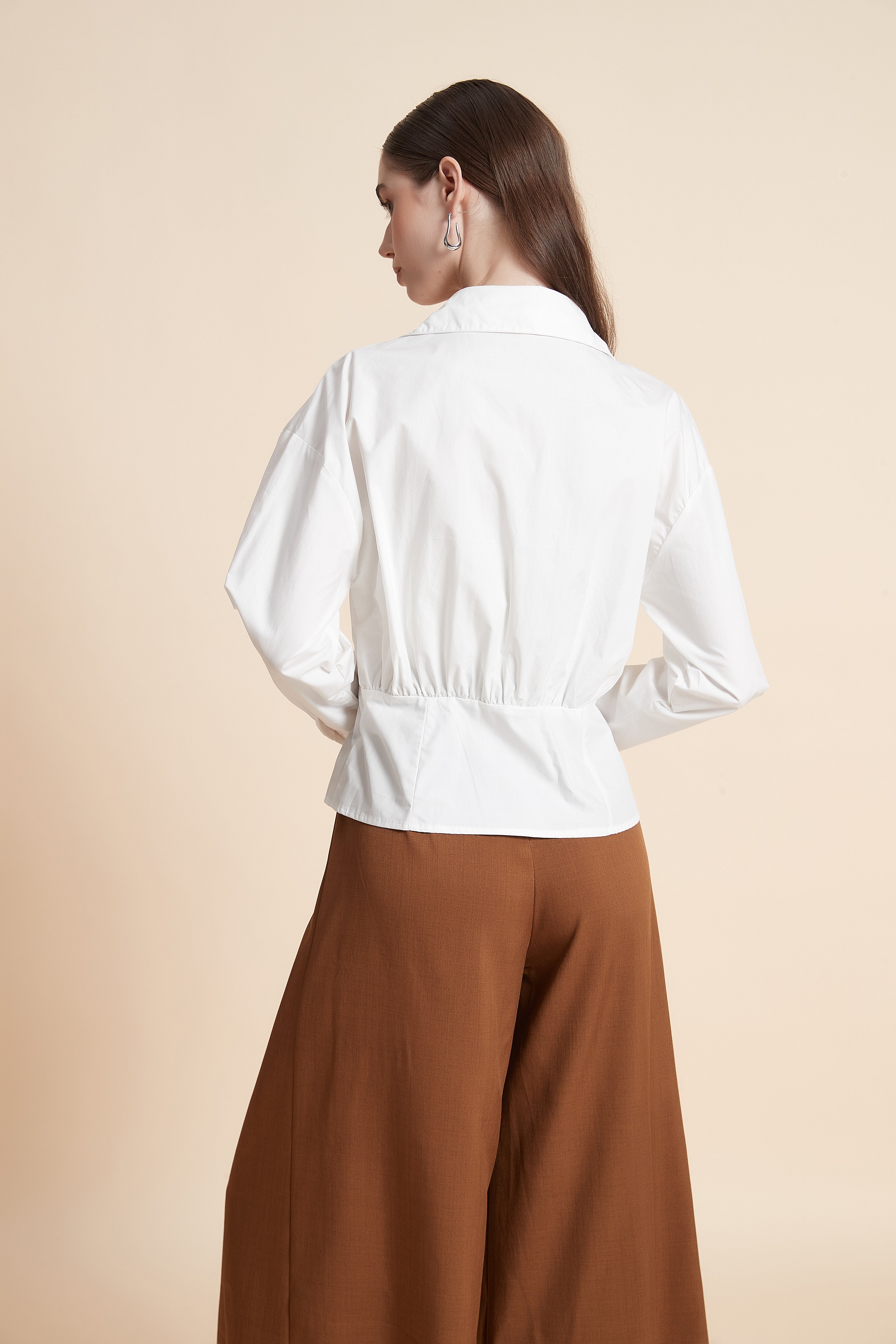 Button-up shirt with peplum hem