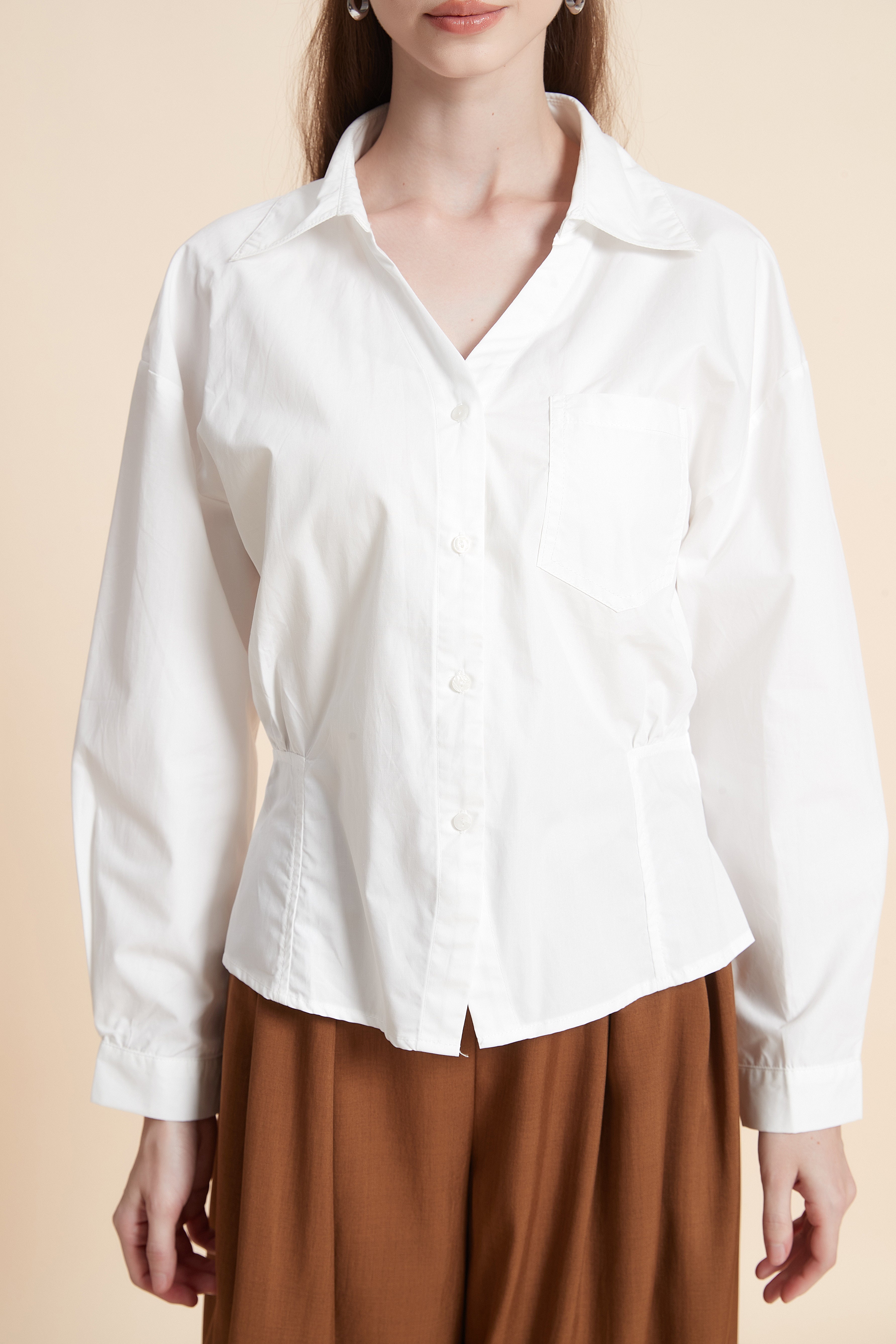 Button-up shirt with peplum hem