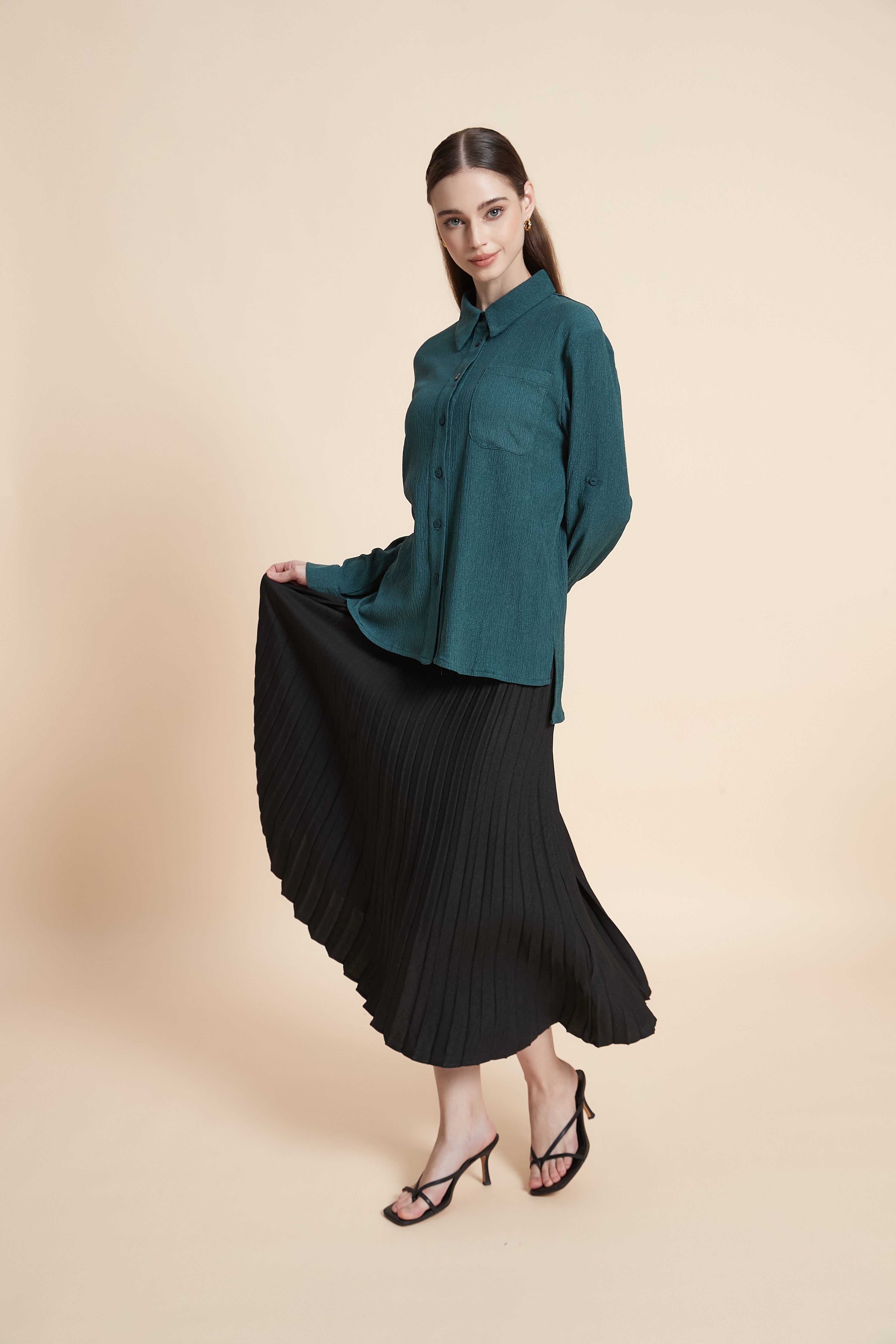 Knife-pleated midi skirt
