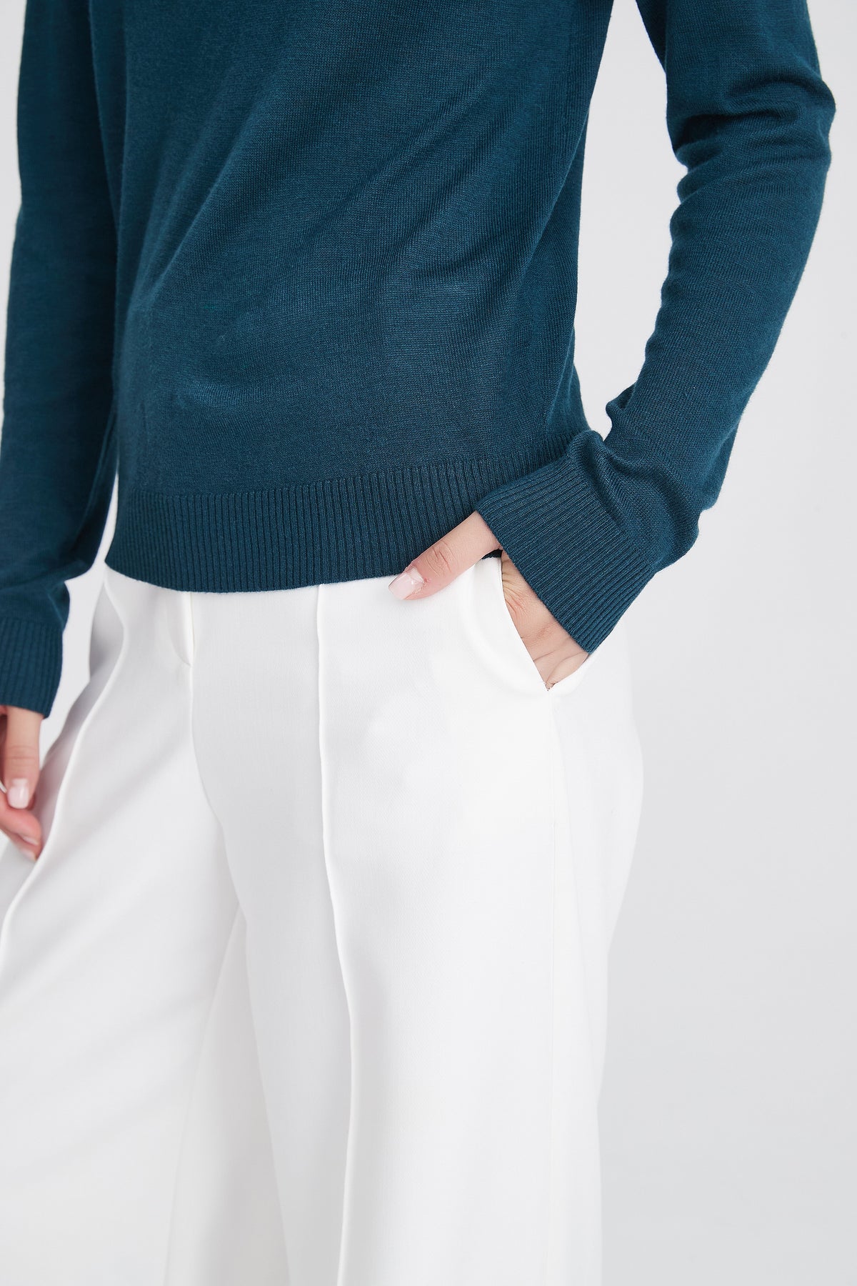 High-Neck Knit Blouse with Layered V-Shaped Detail