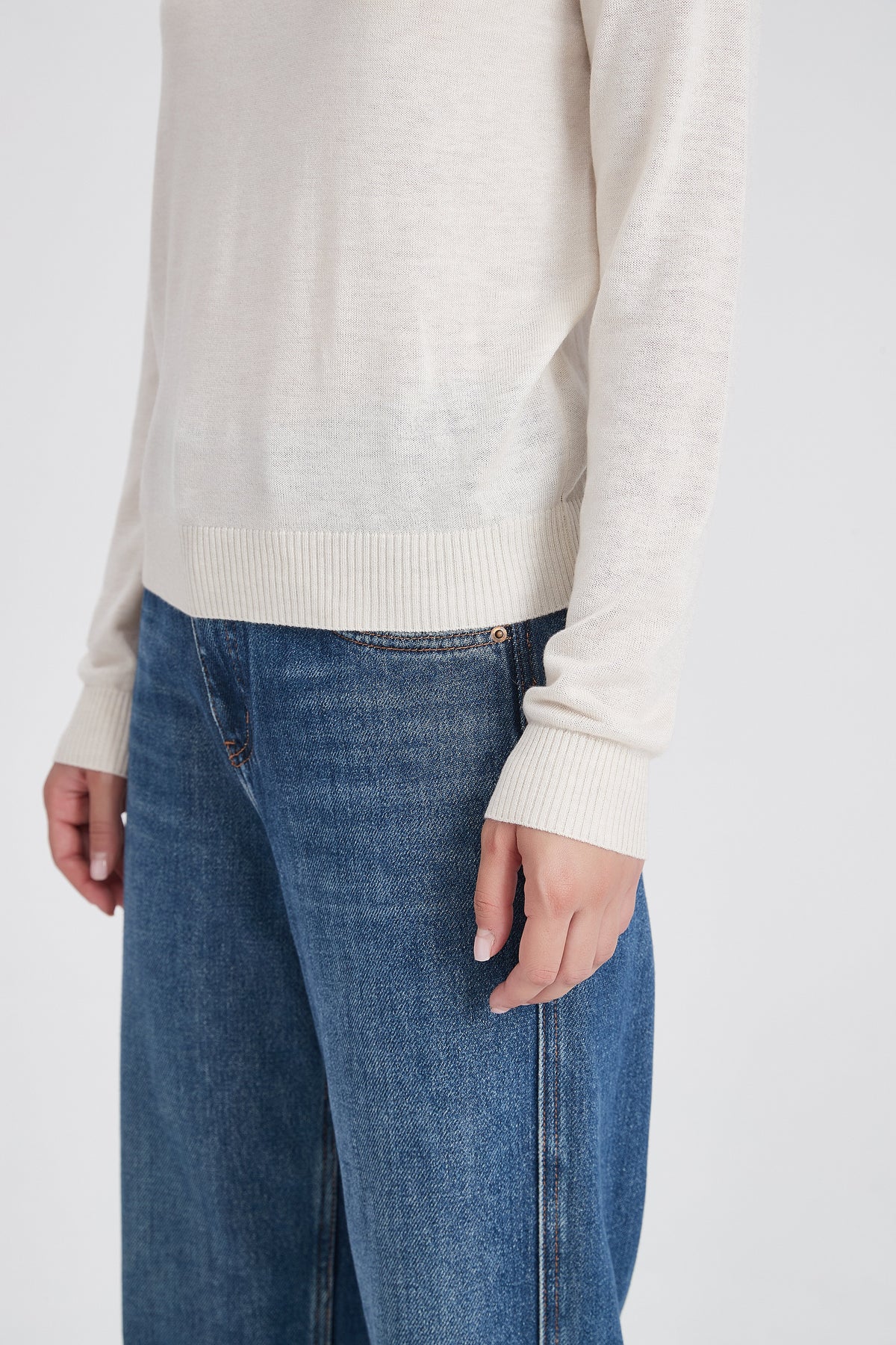 High-Neck Knit Blouse with Layered V-Shaped Detail