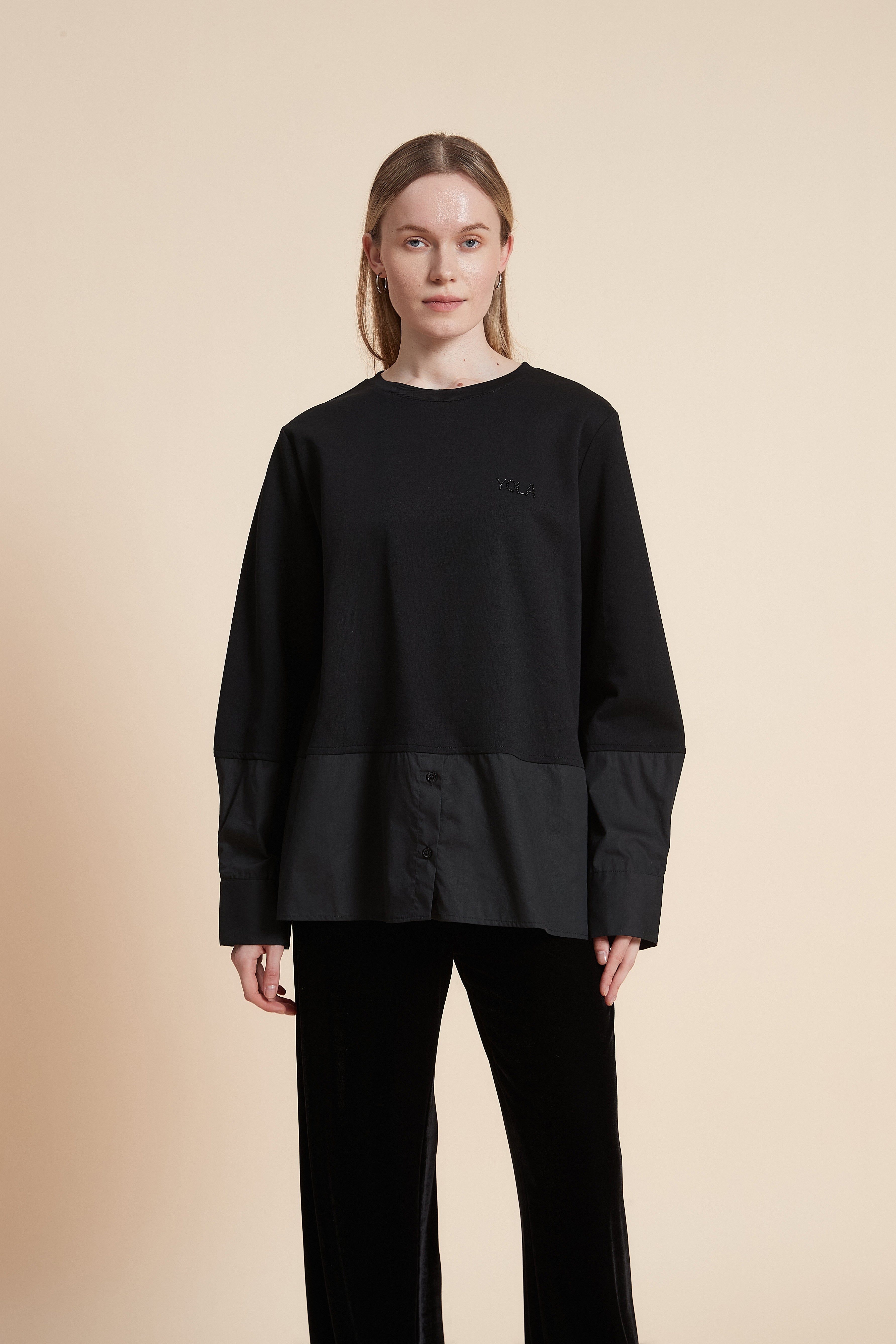 بلوزة بكم طويل بأزرار