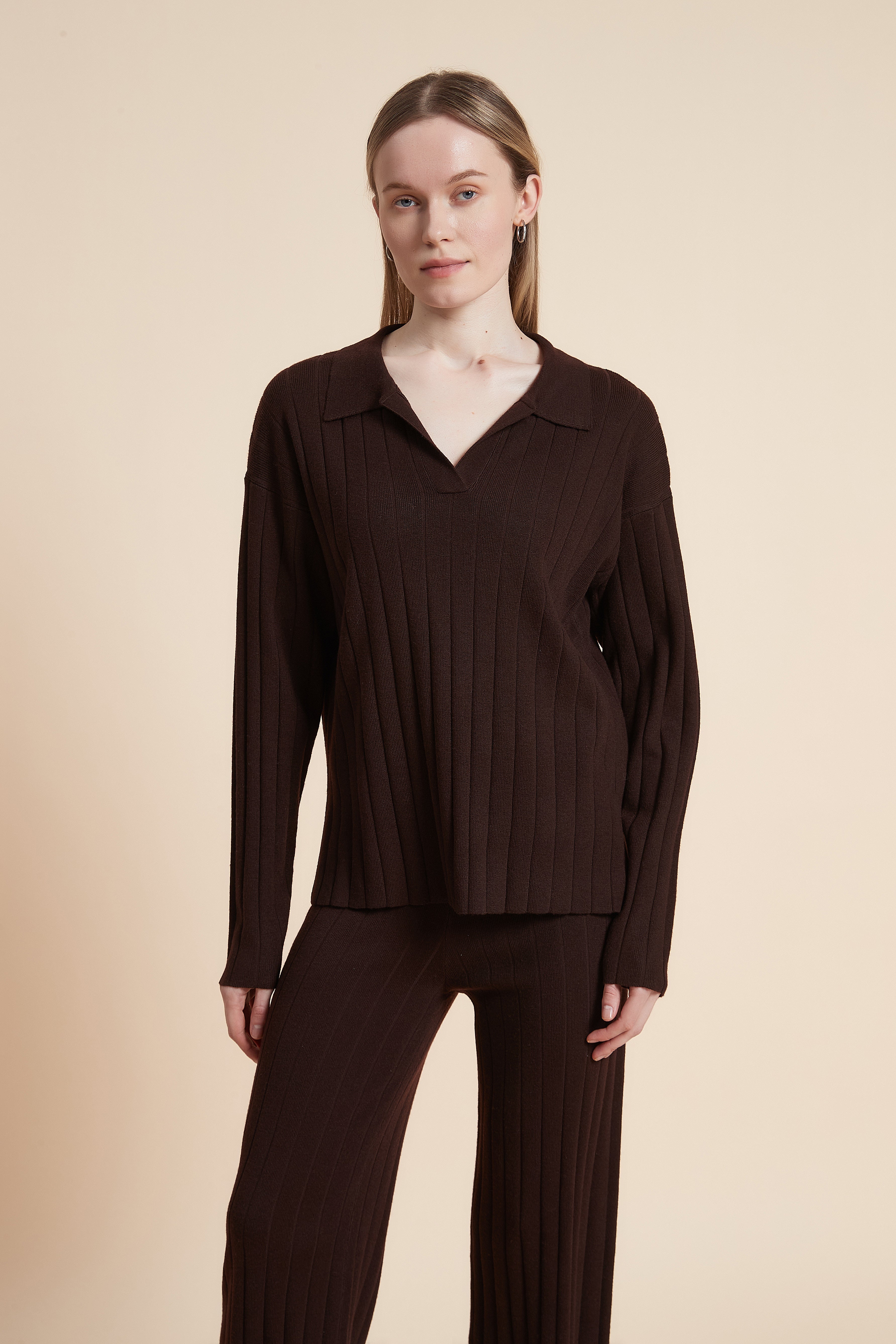 Long sleeve solid ribbed mid-length blouse