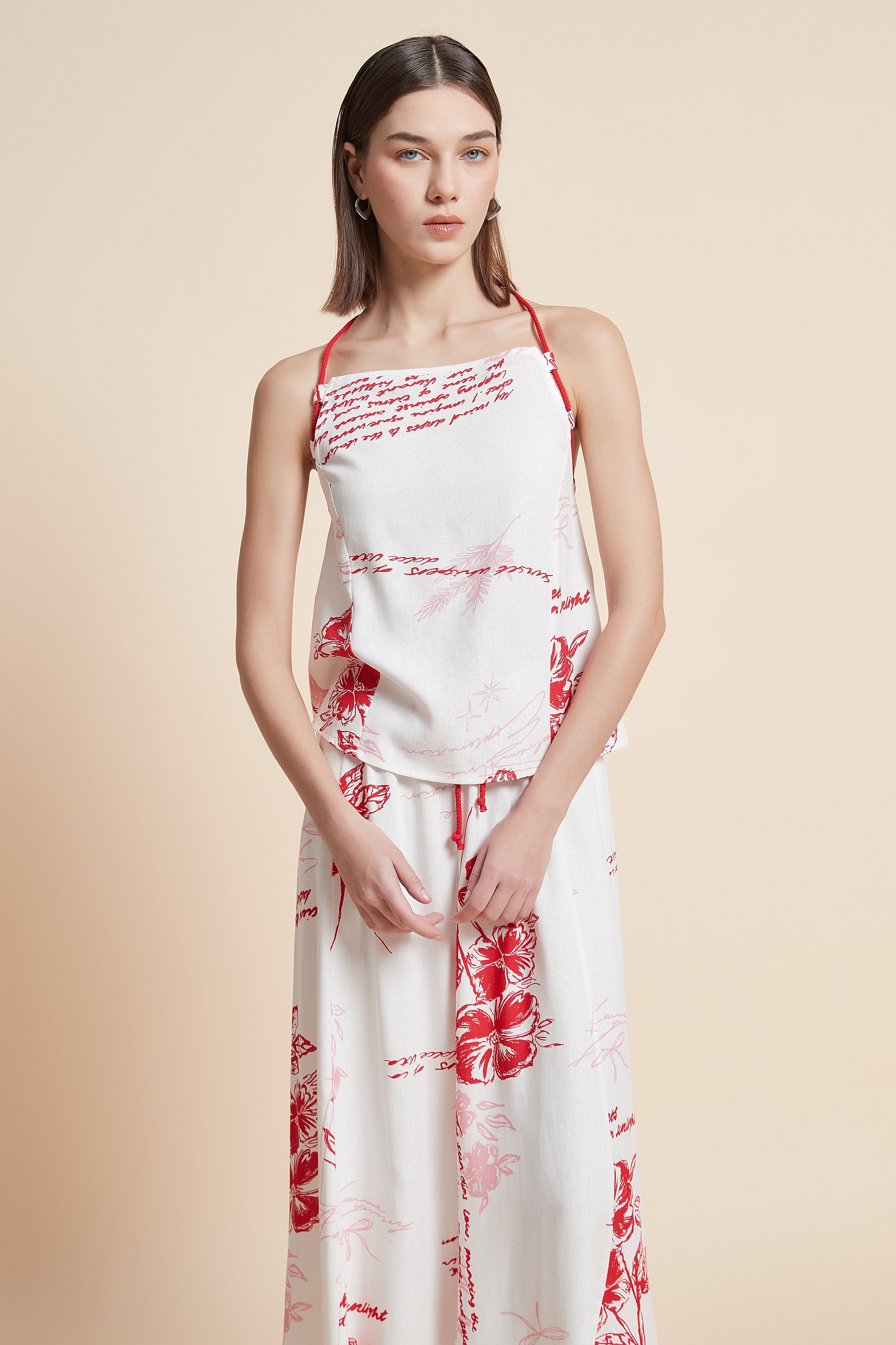 توب مزخرف بطول الخصر