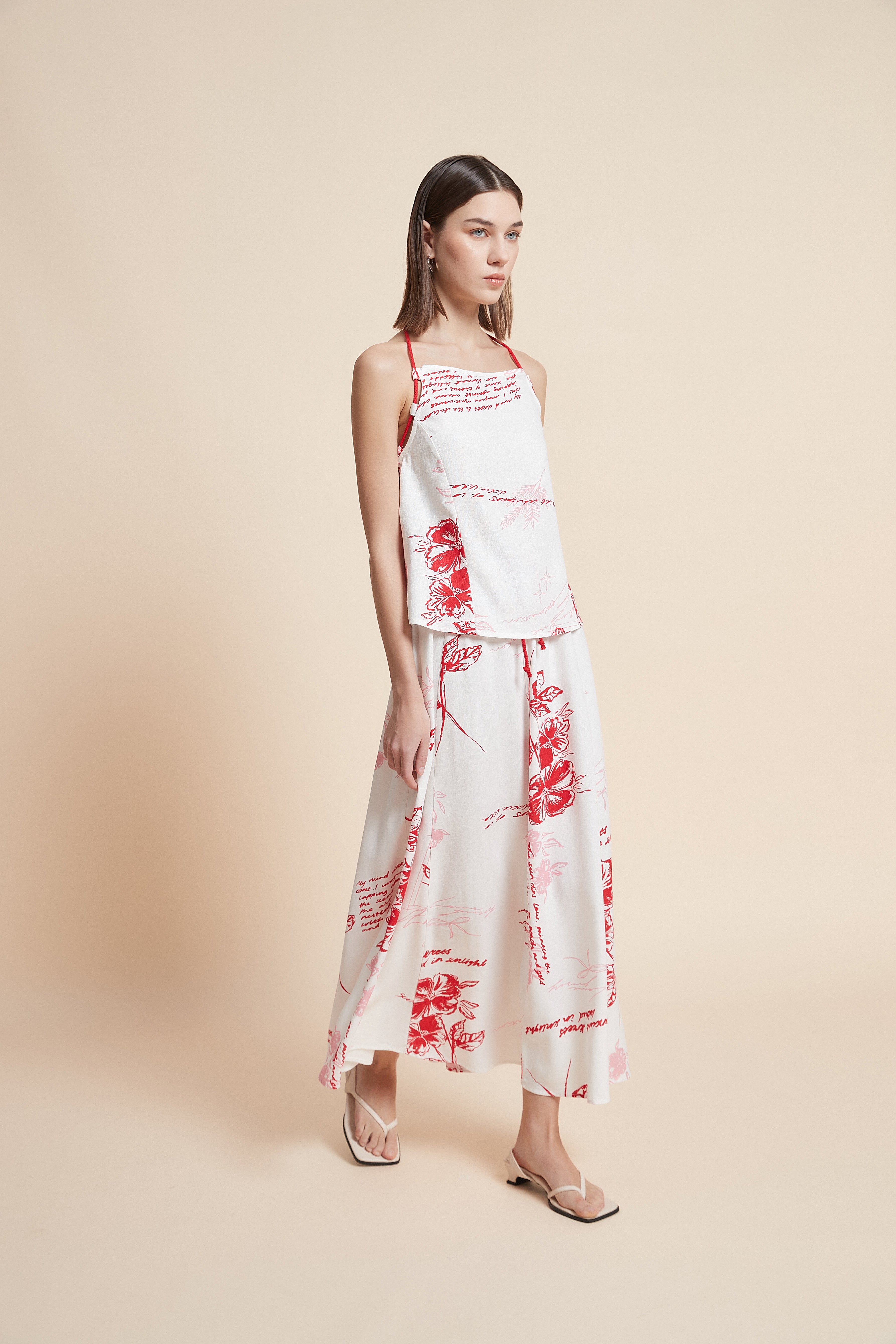 توب مزخرف بطول الخصر