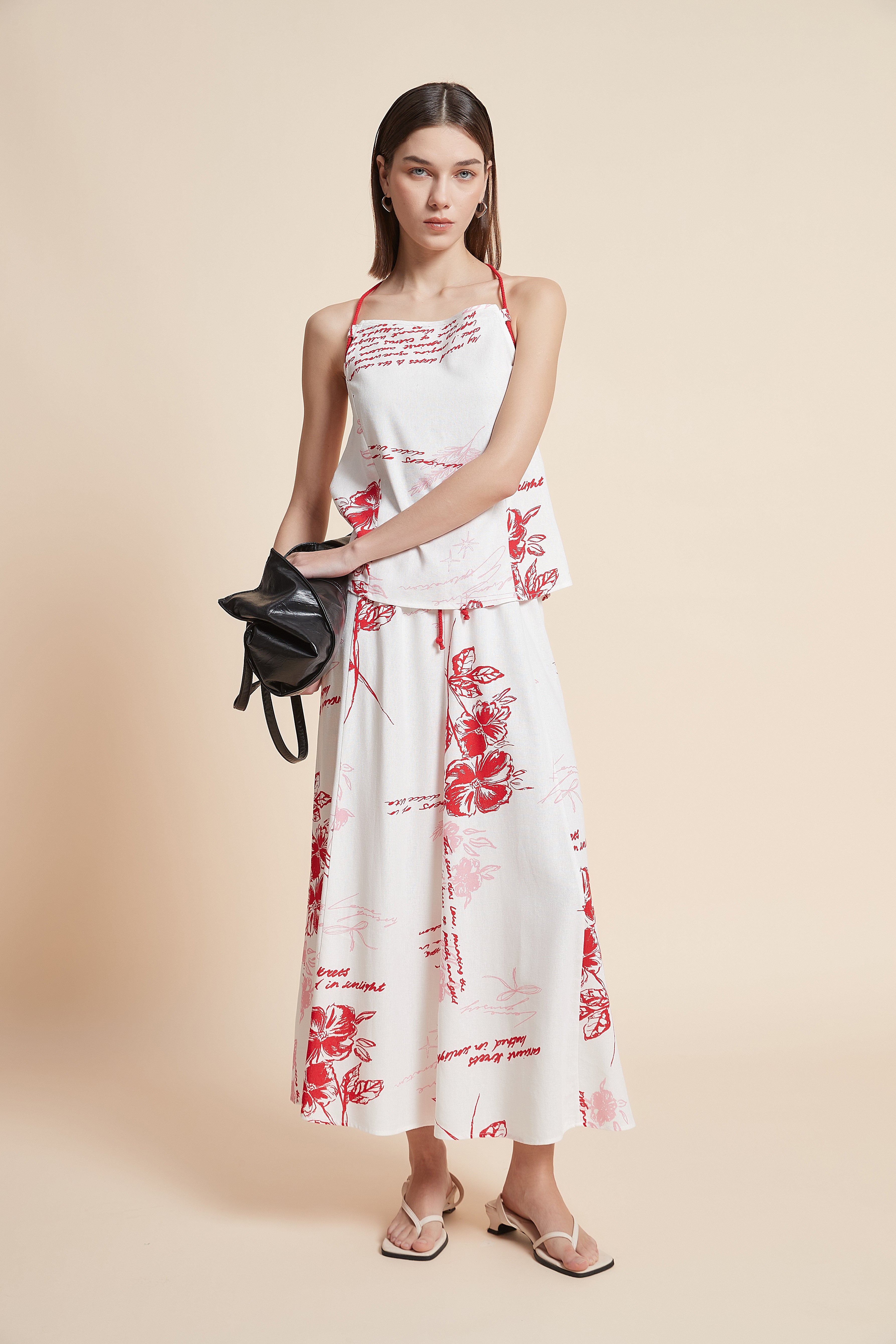 توب مزخرف بطول الخصر