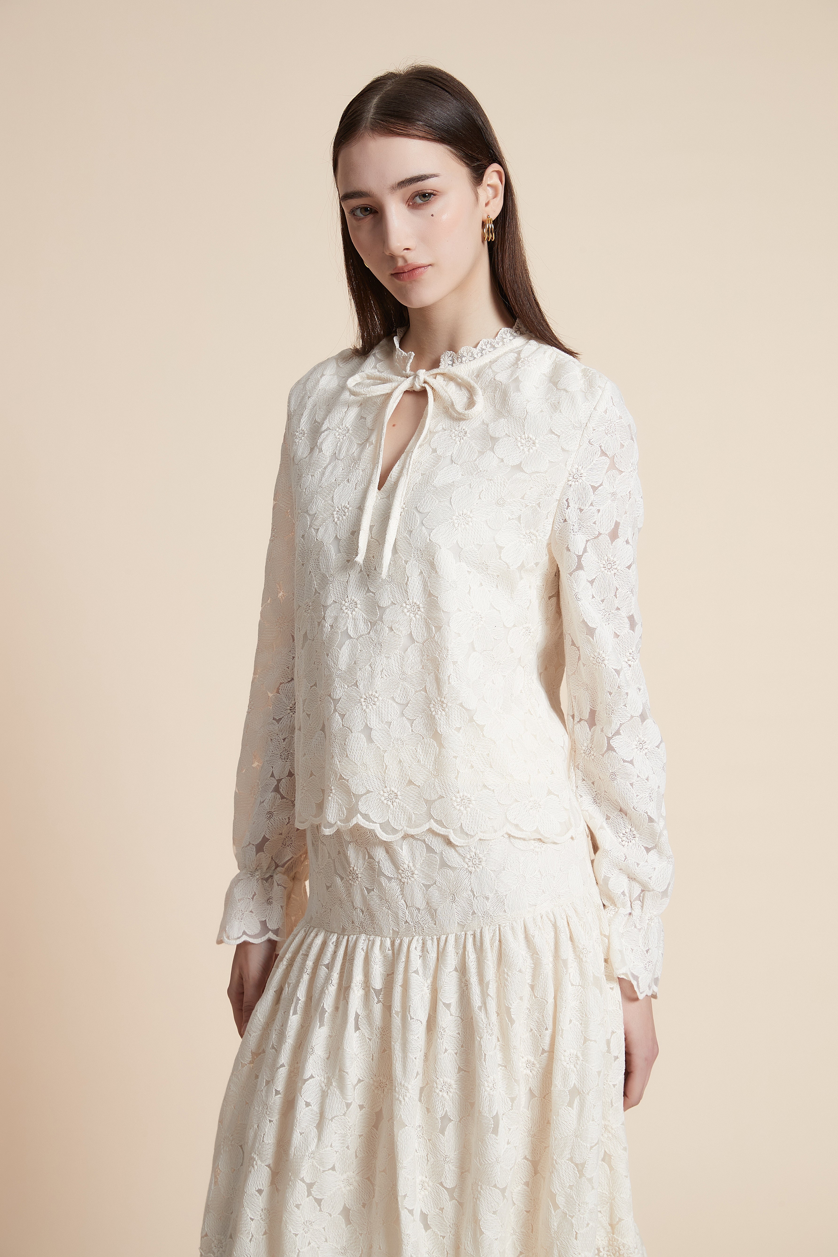 Long-sleeved waist-length top