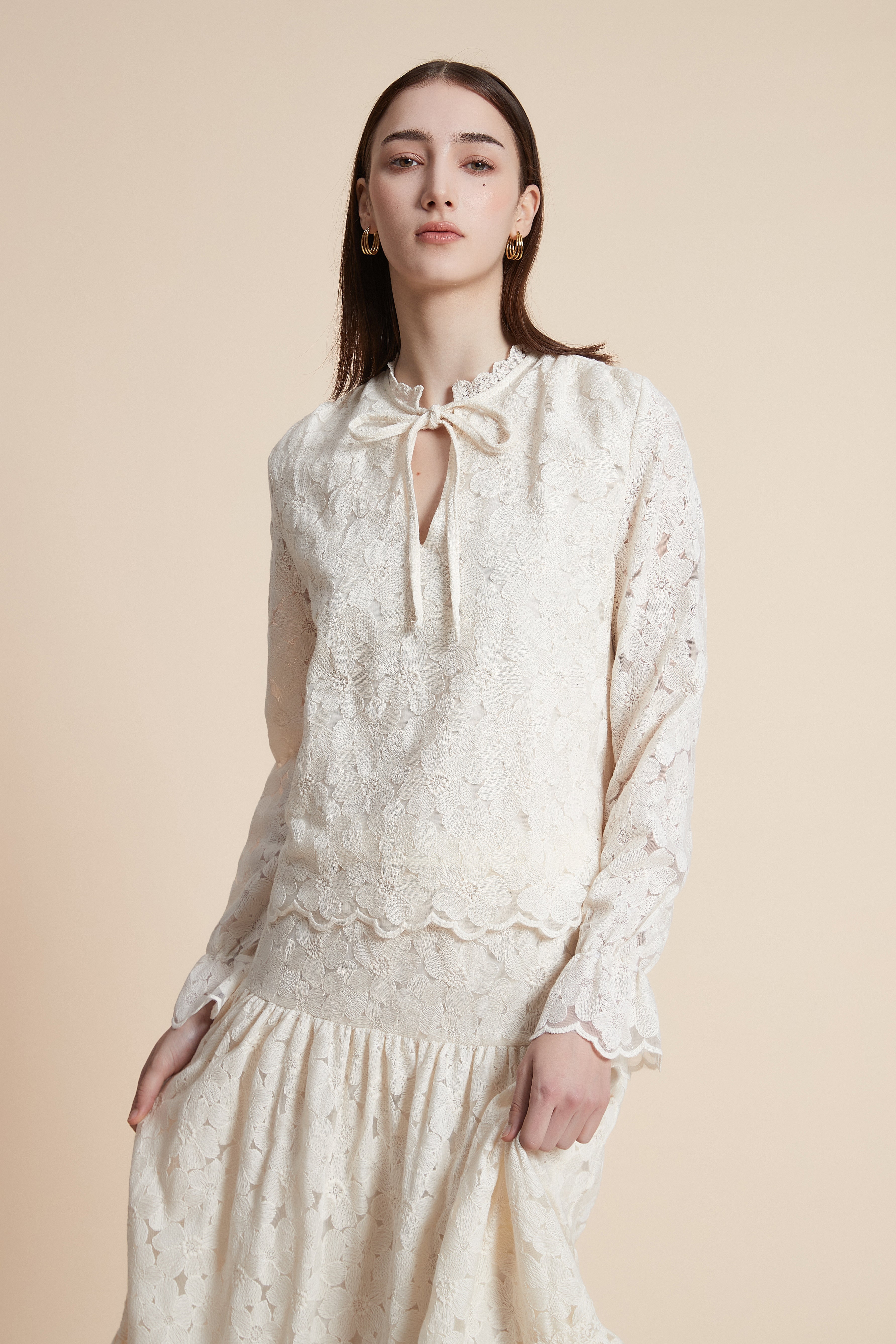 Long-sleeved waist-length top