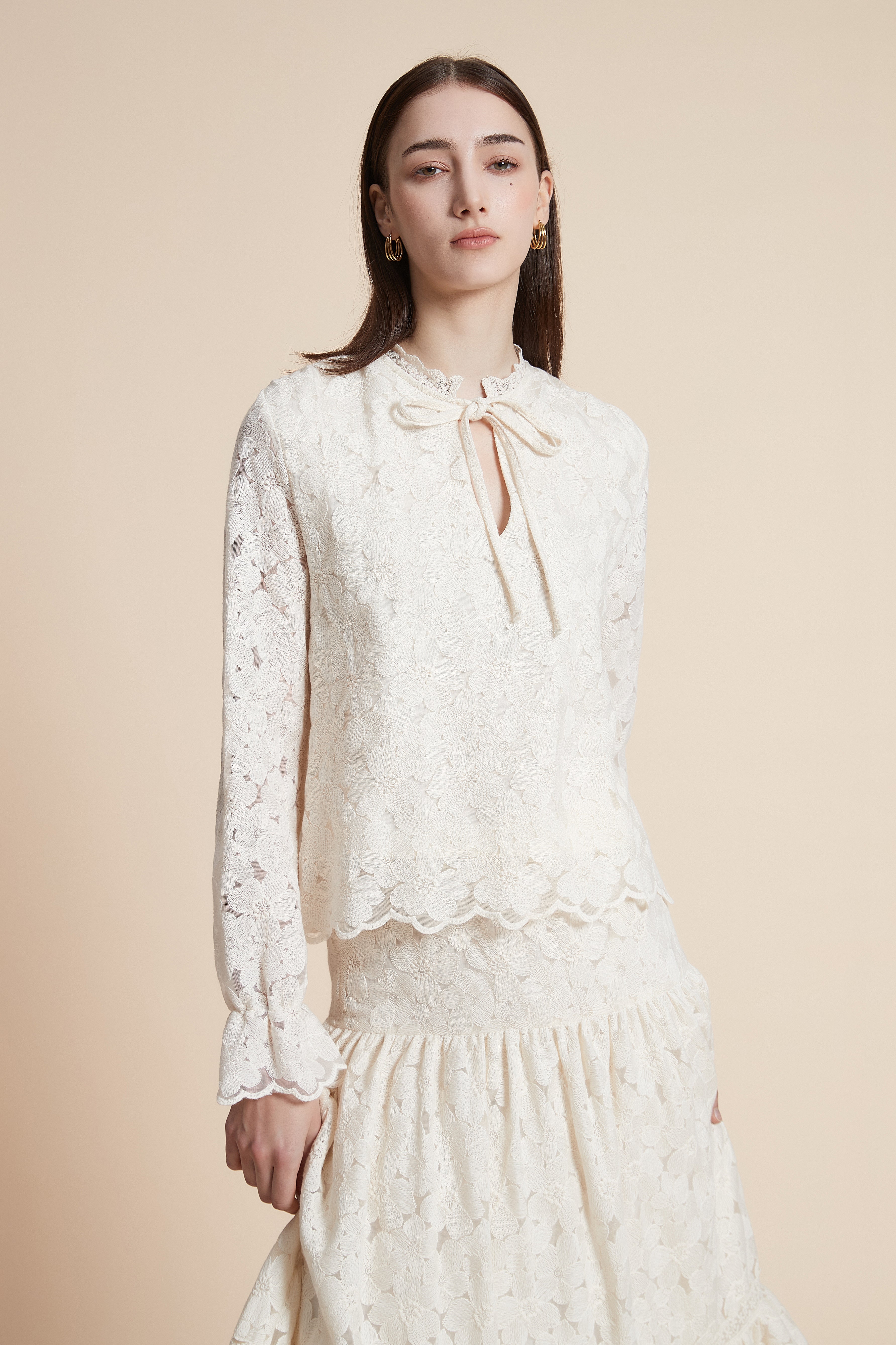 Long-sleeved waist-length top