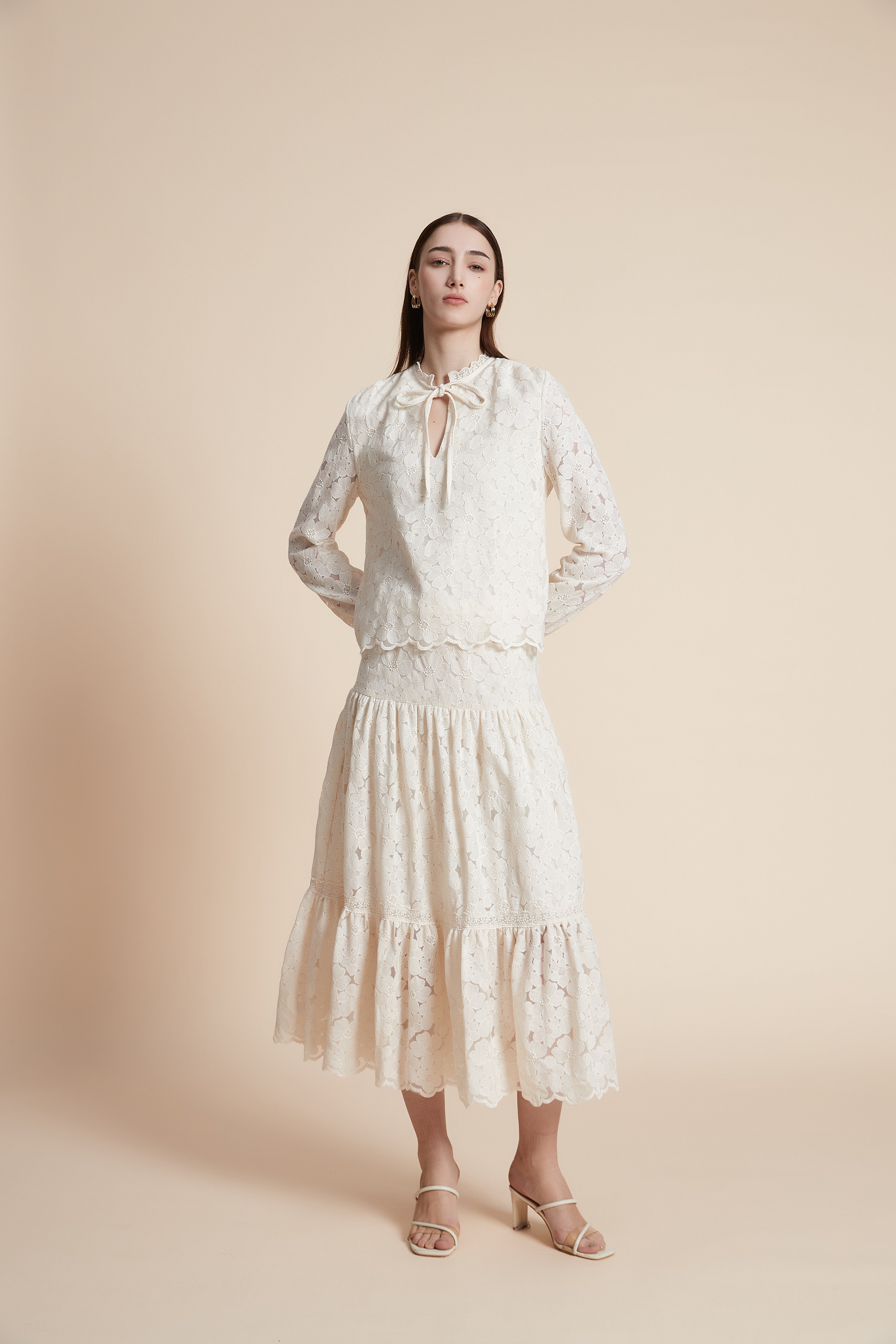 Long-sleeved waist-length top