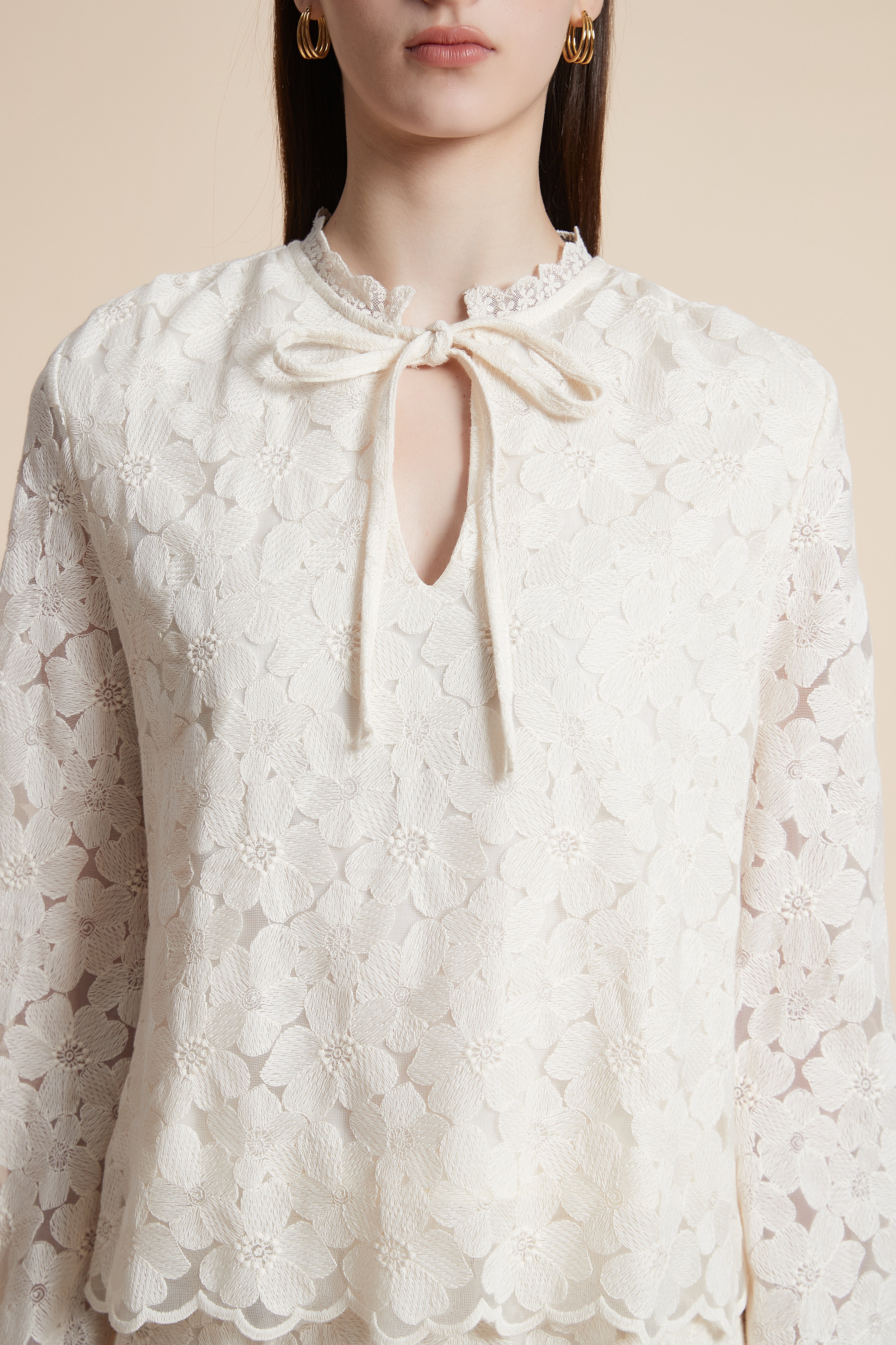 Long-sleeved waist-length top