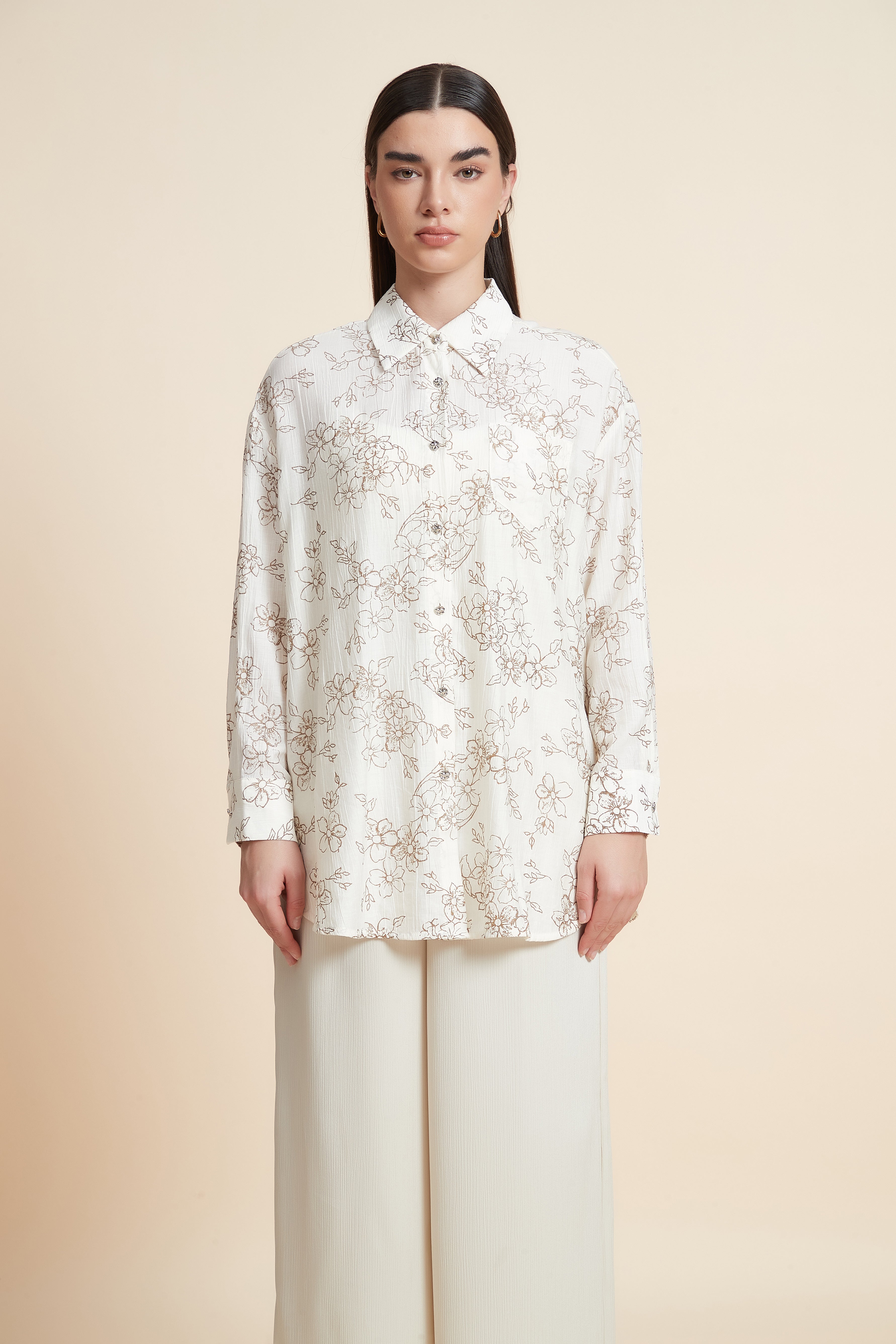 بلوزة منقوشة بكم طويل وياقة قميص