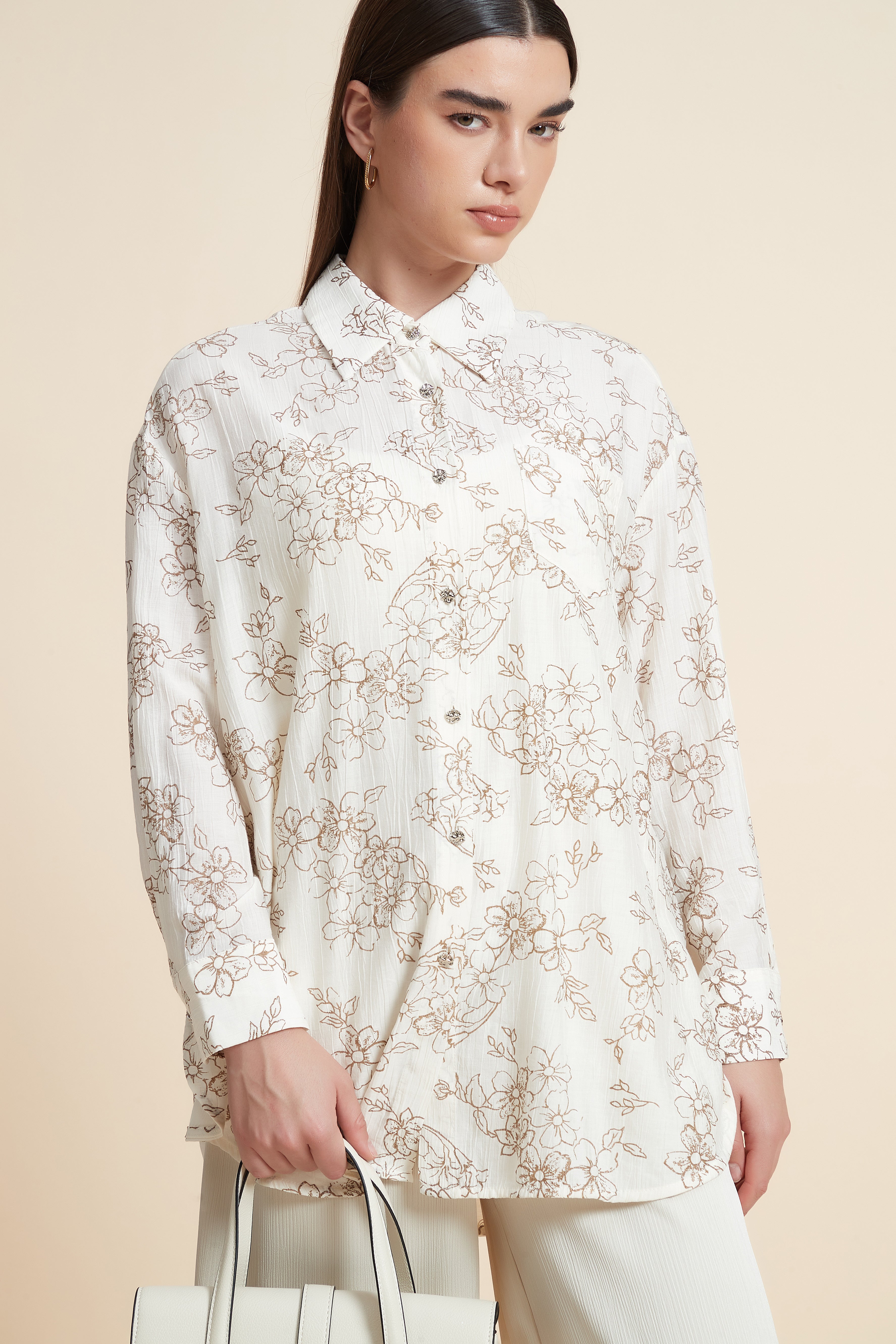 بلوزة منقوشة بكم طويل وياقة قميص