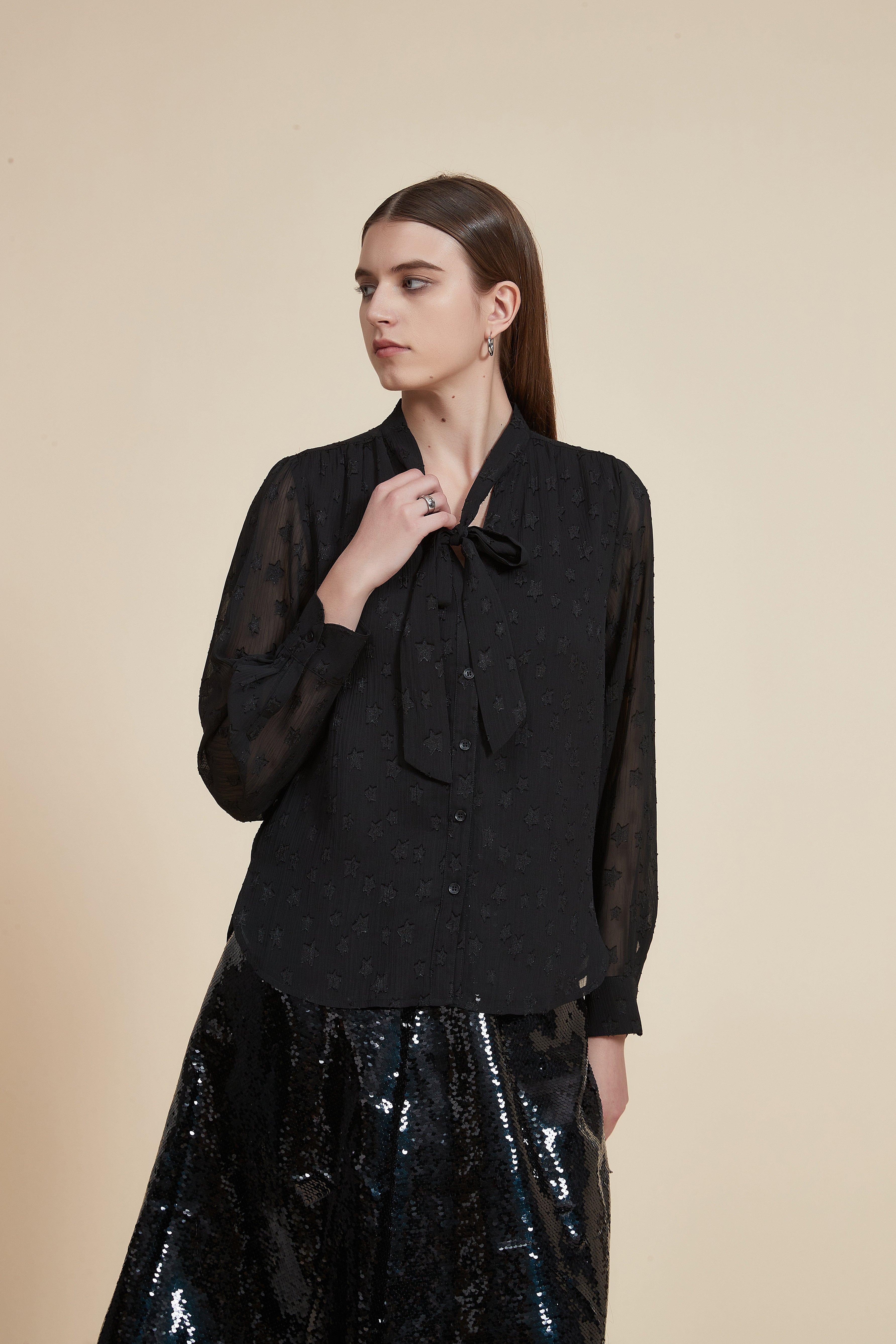 Polka dot long-sleeve waist-length top