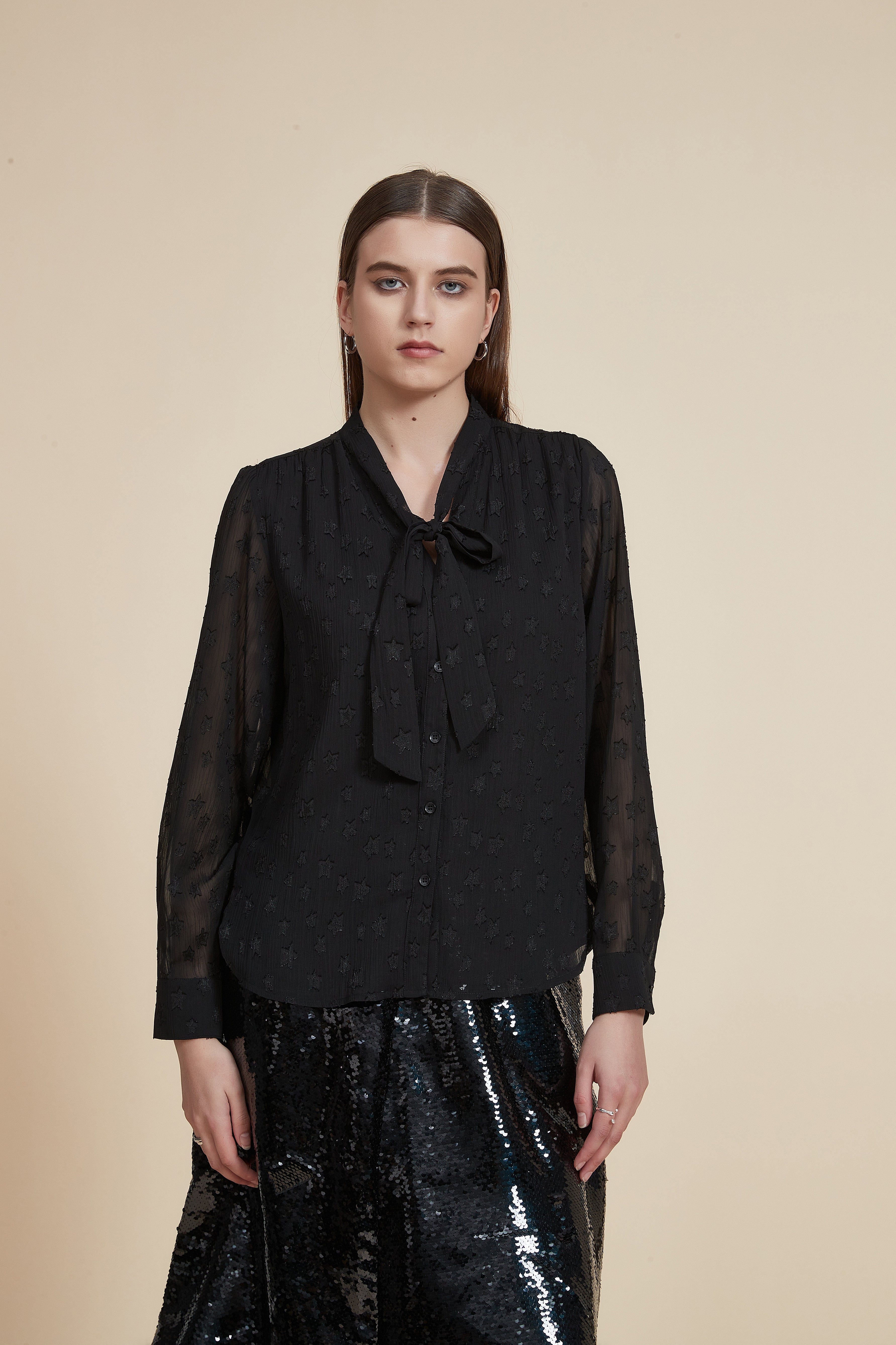 Polka dot long-sleeve waist-length top