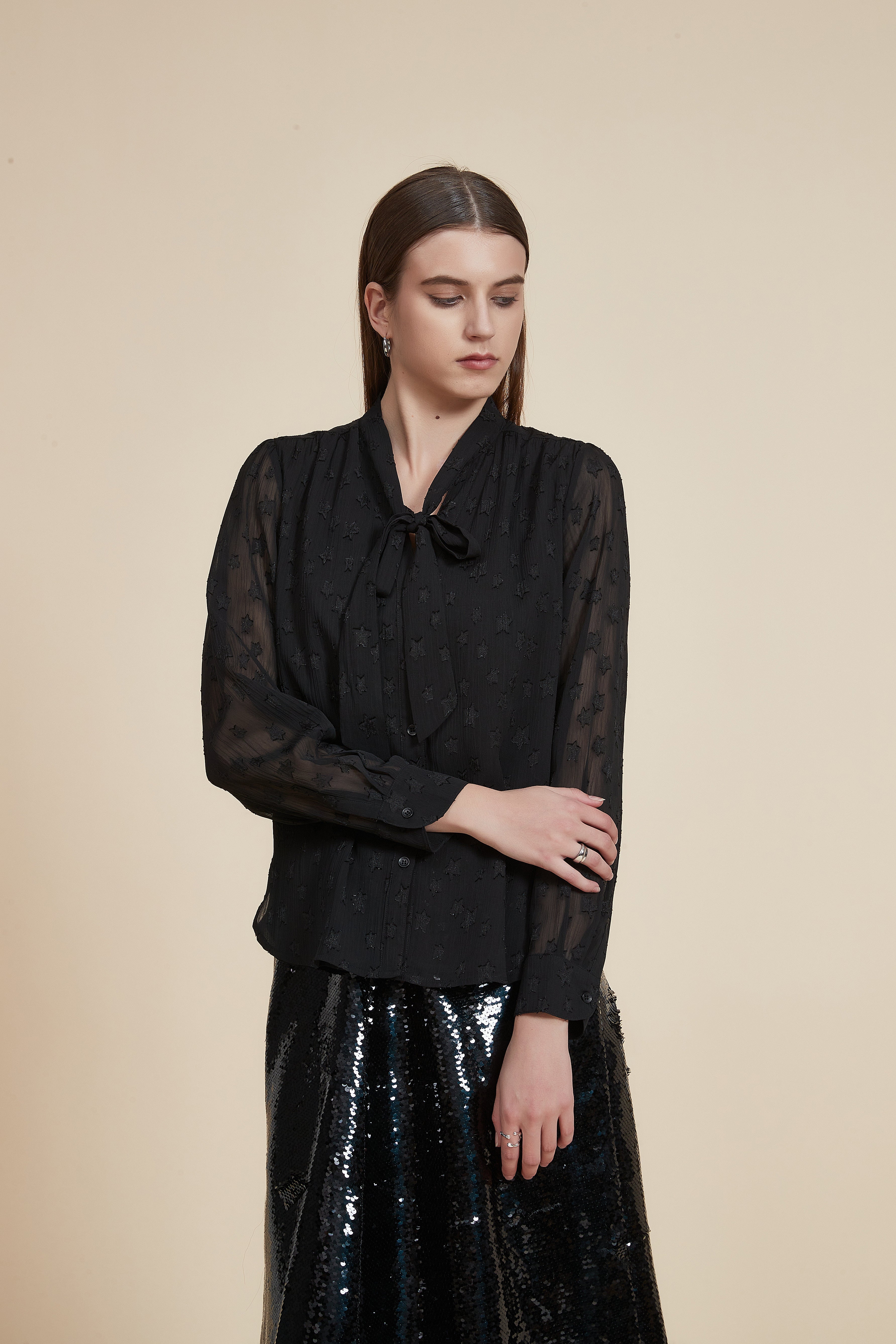 Polka dot long-sleeve waist-length top