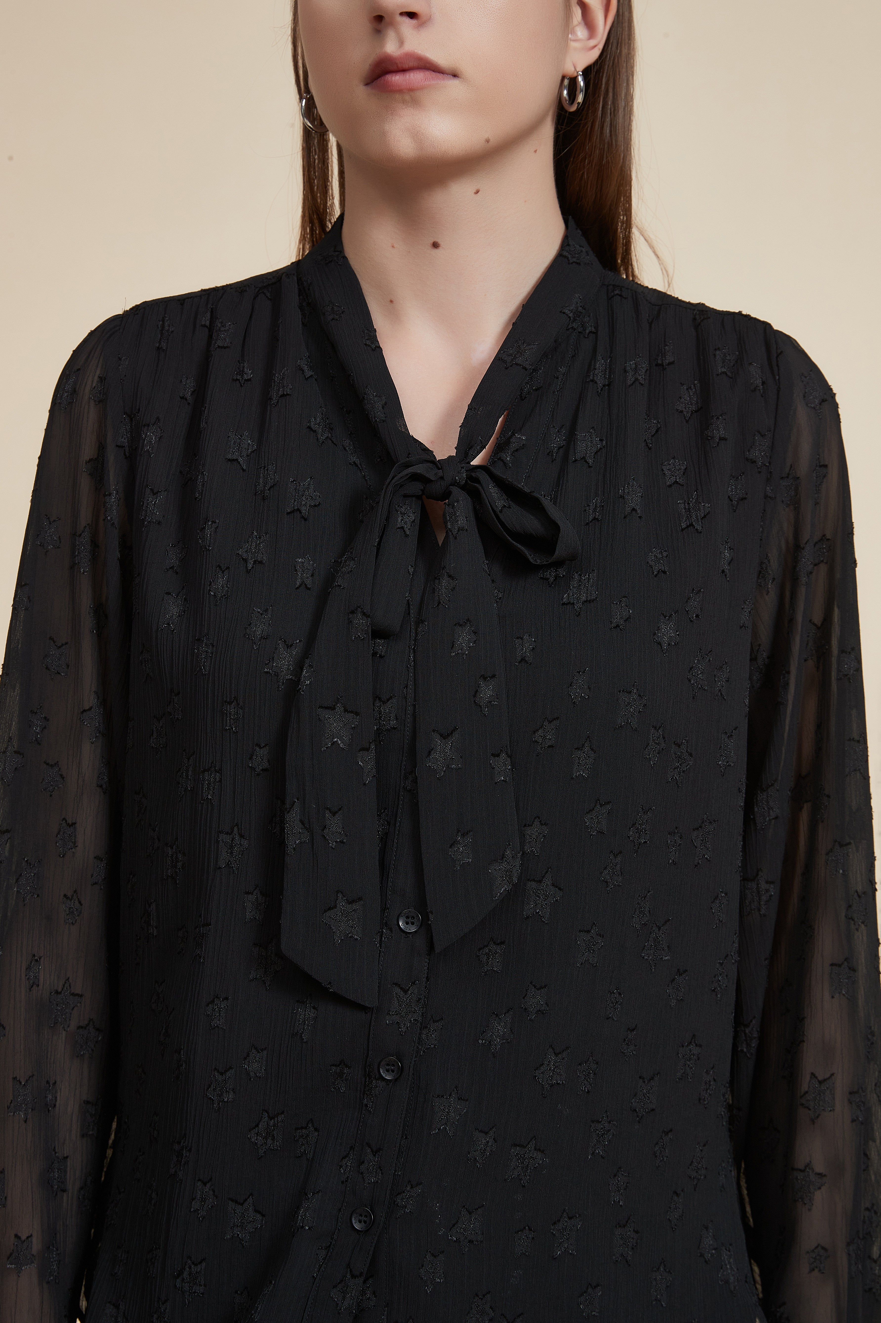 Polka dot long-sleeve waist-length top