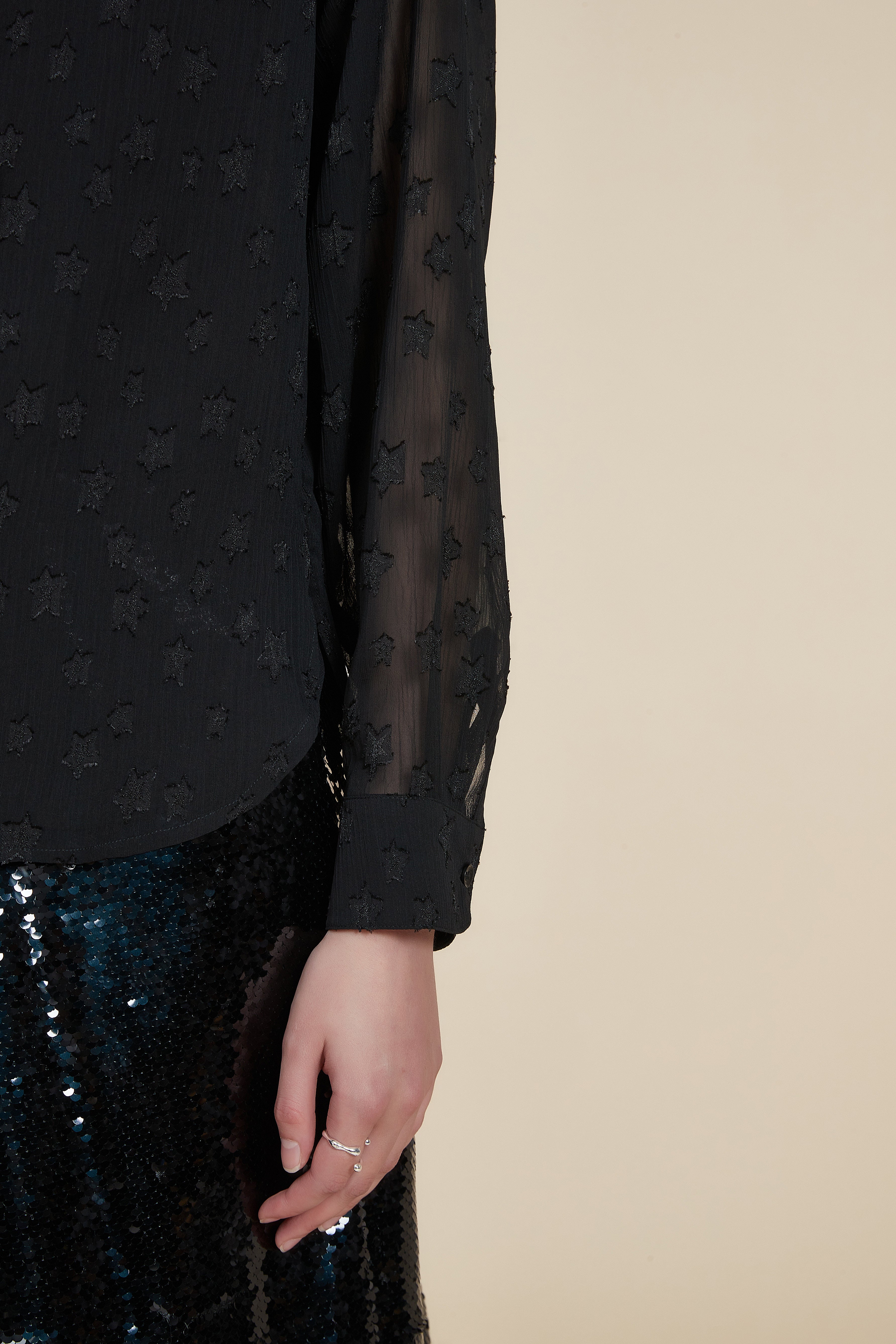 Polka dot long-sleeve waist-length top