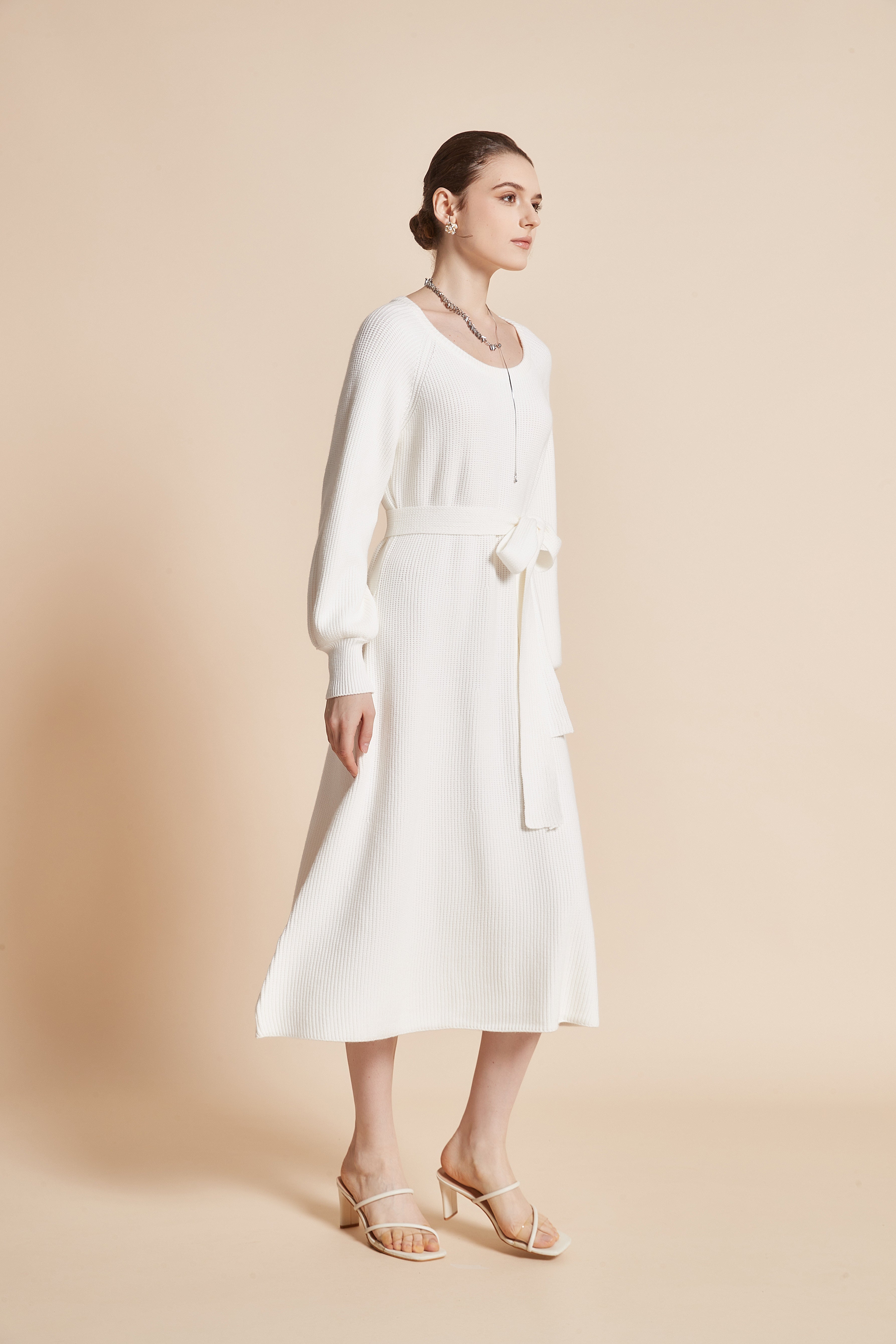 Yola Midi dress with a round neckline, long wide sleeves, and a waist tie