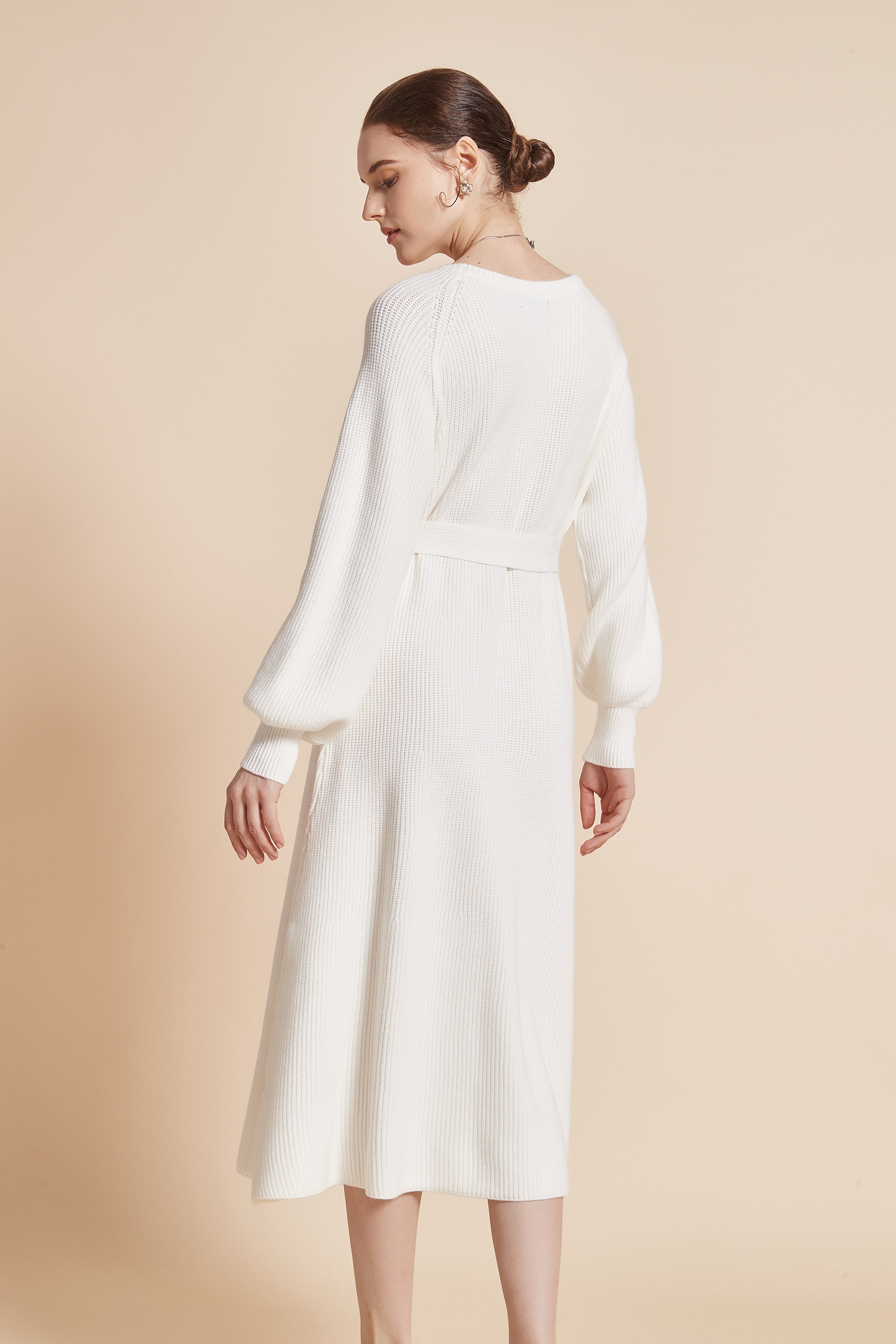 Yola Midi dress with a round neckline, long wide sleeves, and a waist tie