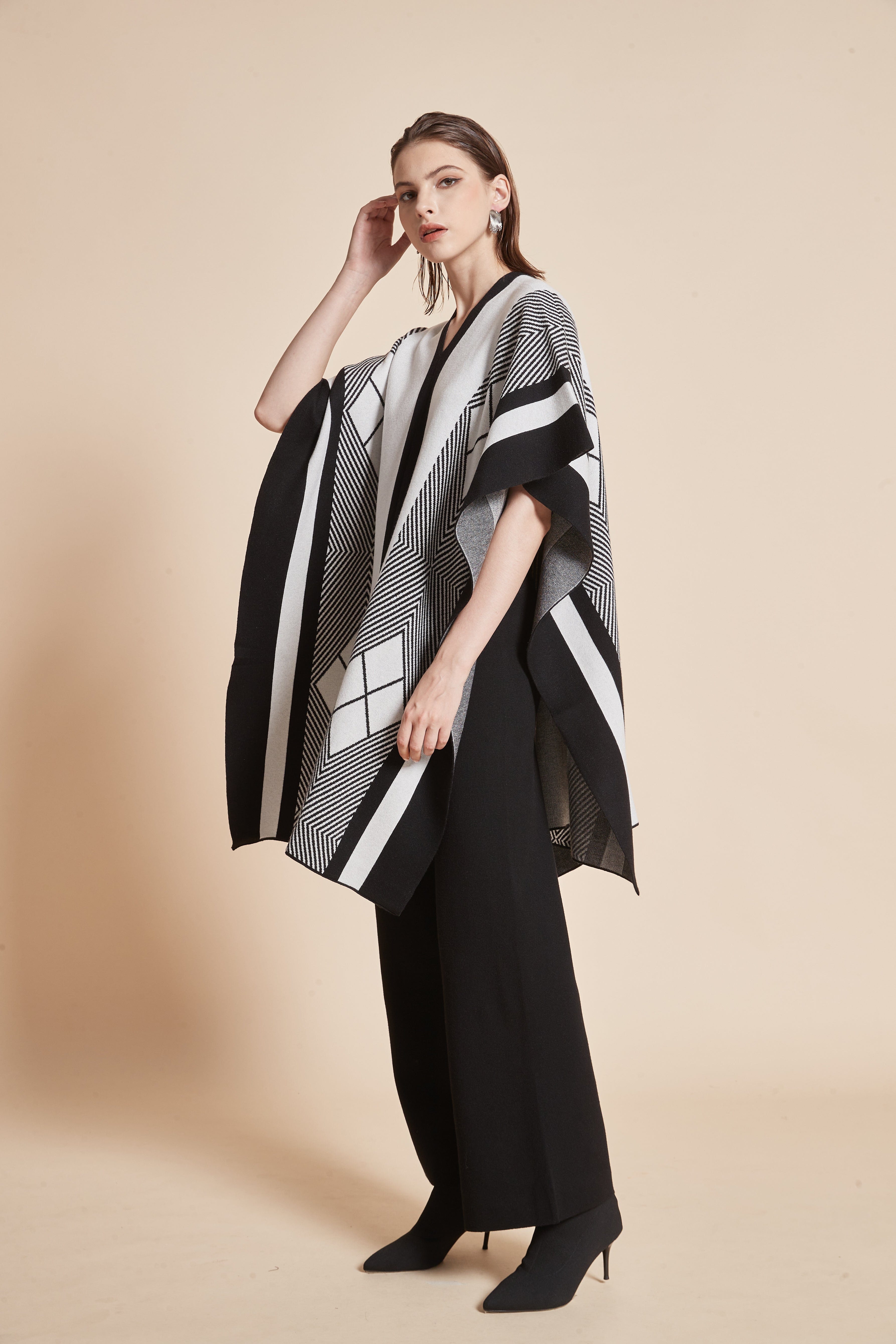Long V-neck blouse with striped and checkered details