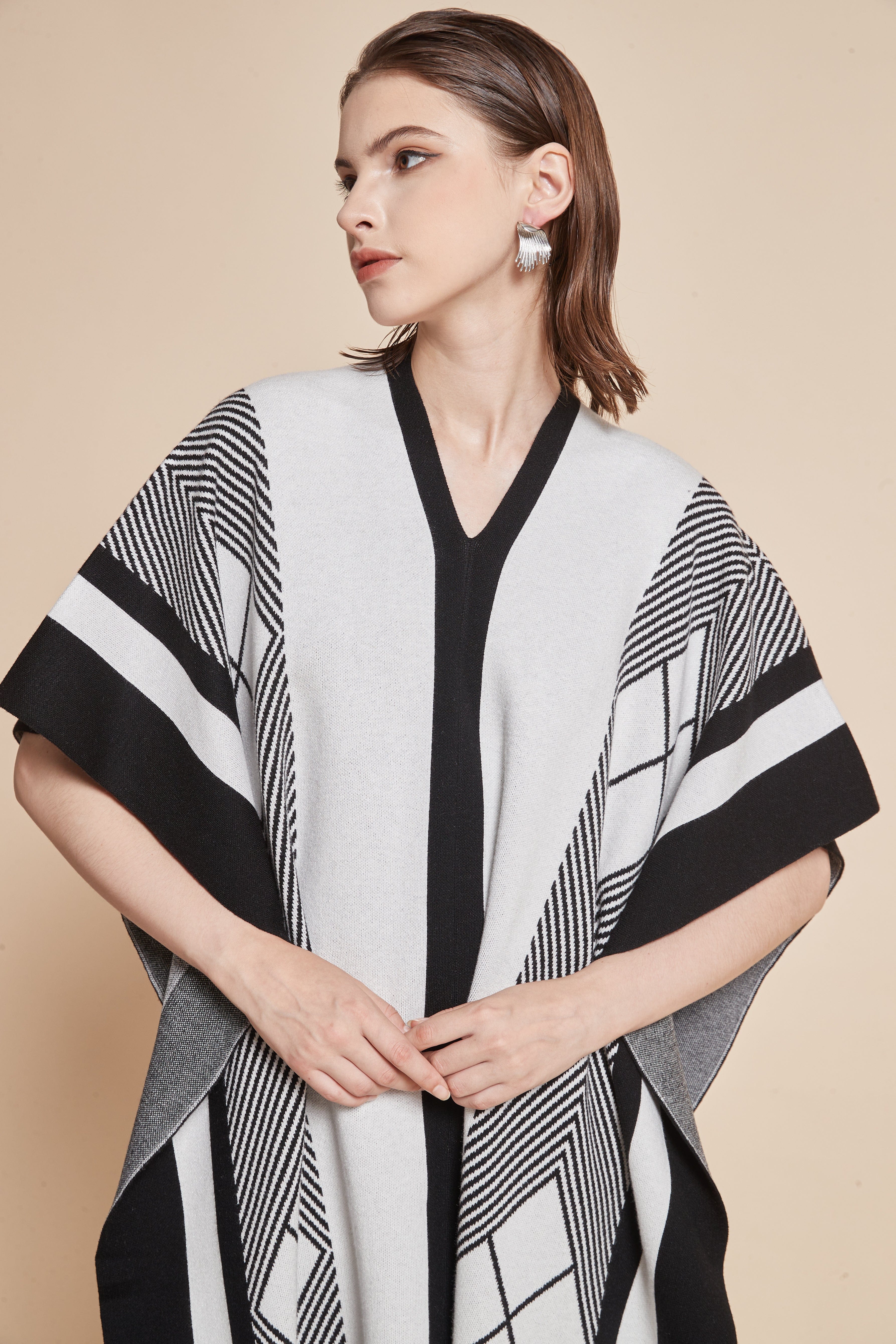 Long V-neck blouse with striped and checkered details