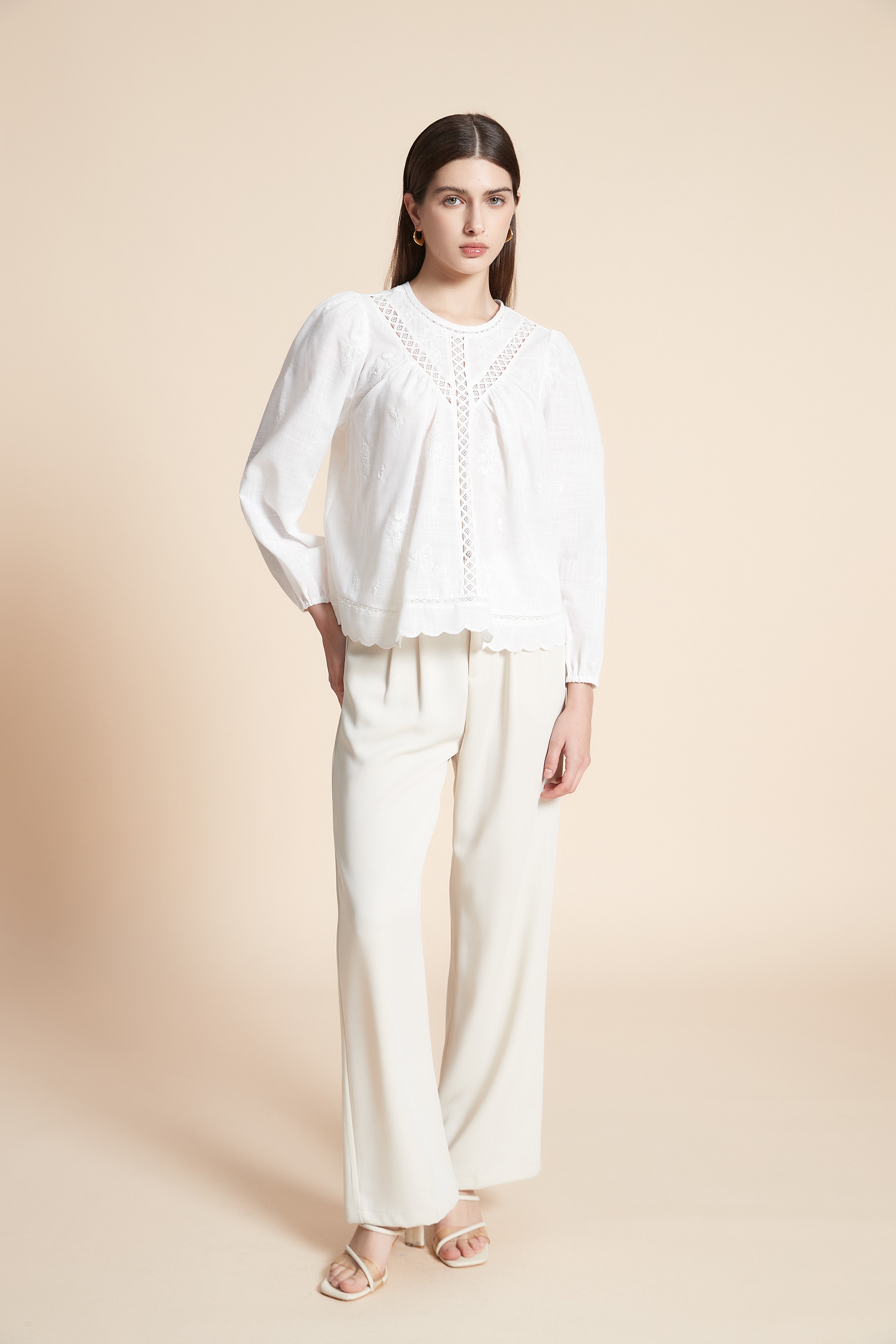 بلوزة متوسطة الطول سادة كم طويل